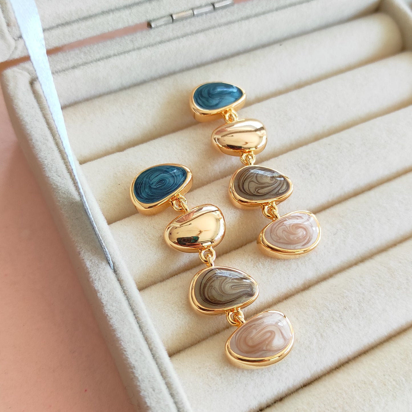 Golden enameled bubble dangling earrings