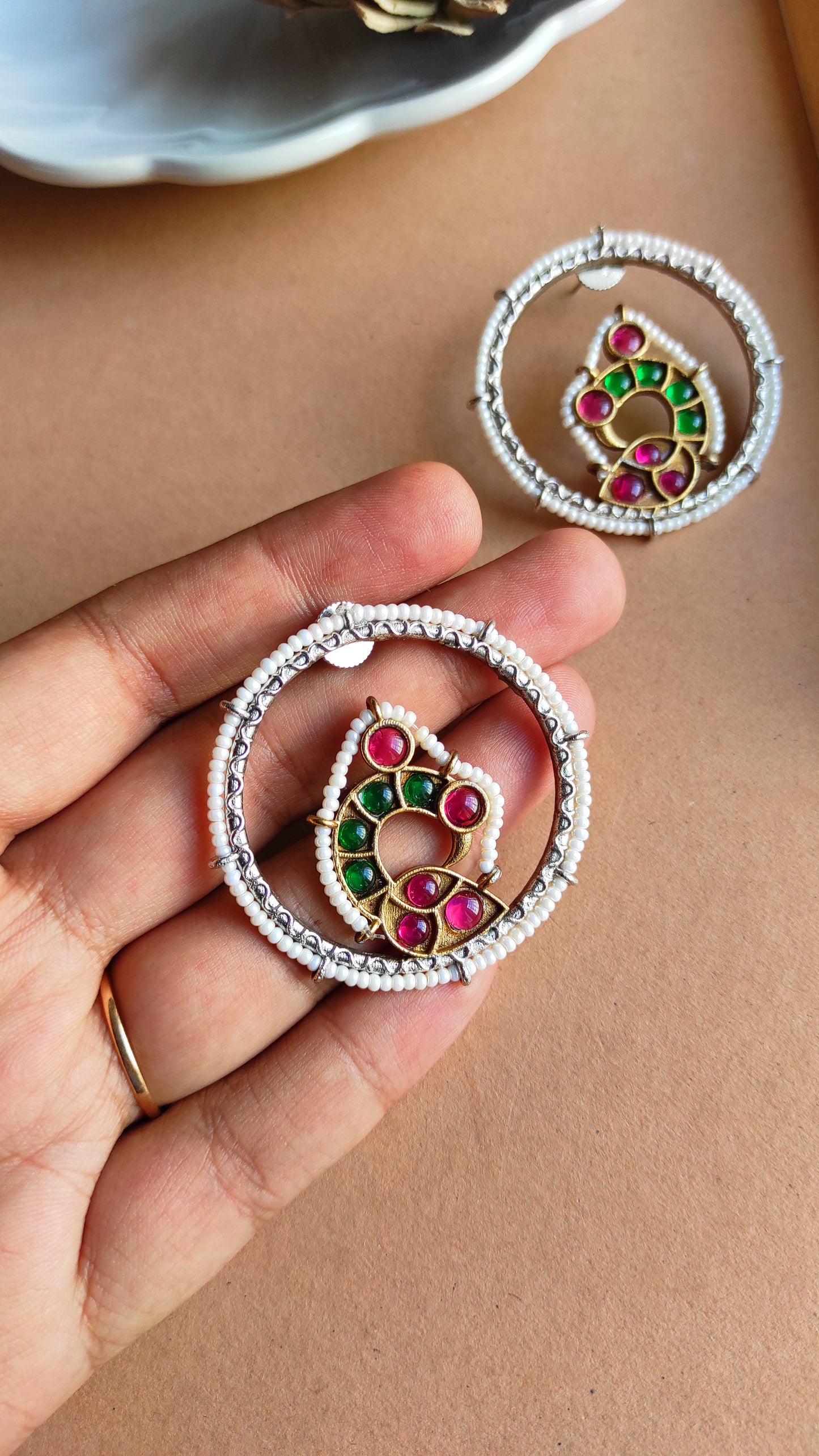 Beaded peacock studs