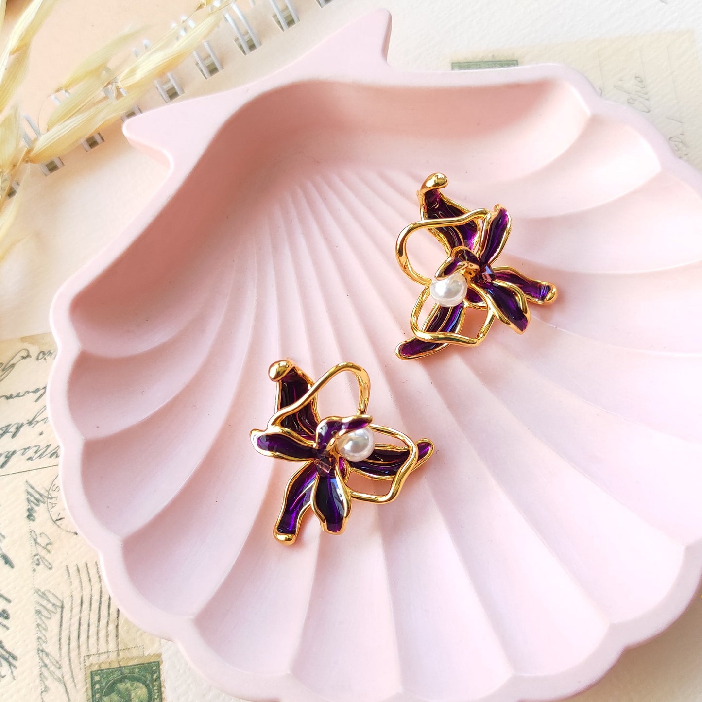 Golden enameled flora studs earrings