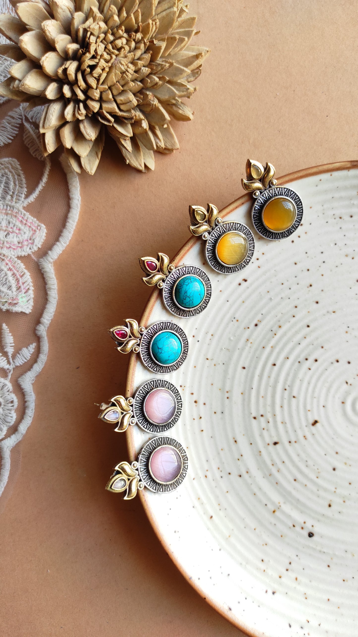 Mayuni dual tone studs earrings