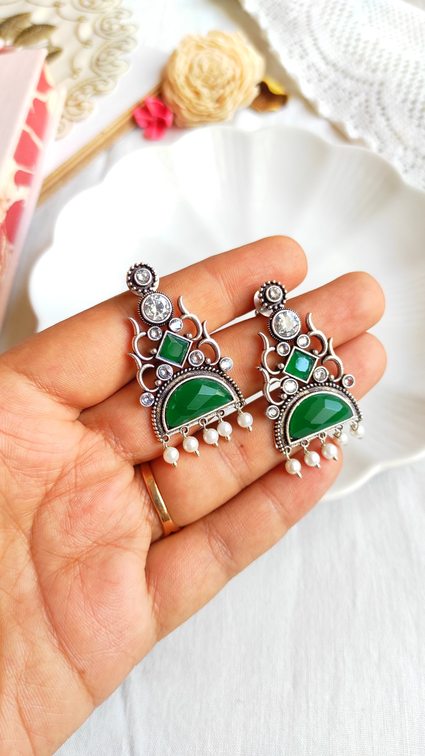 Green studs earrings