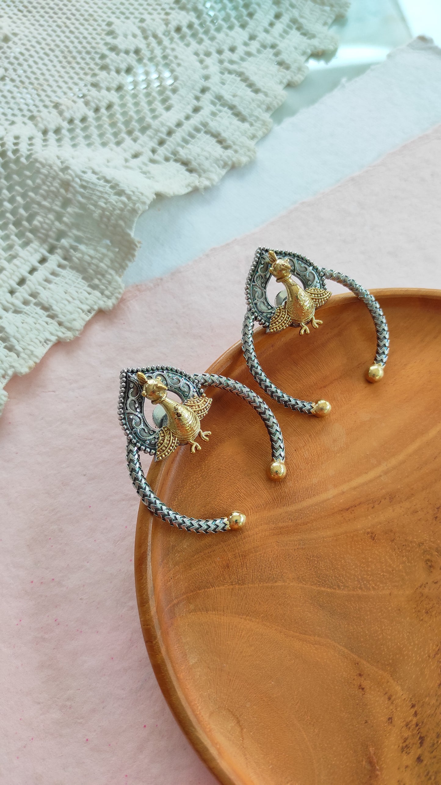 Peacock dual tone stud earrings