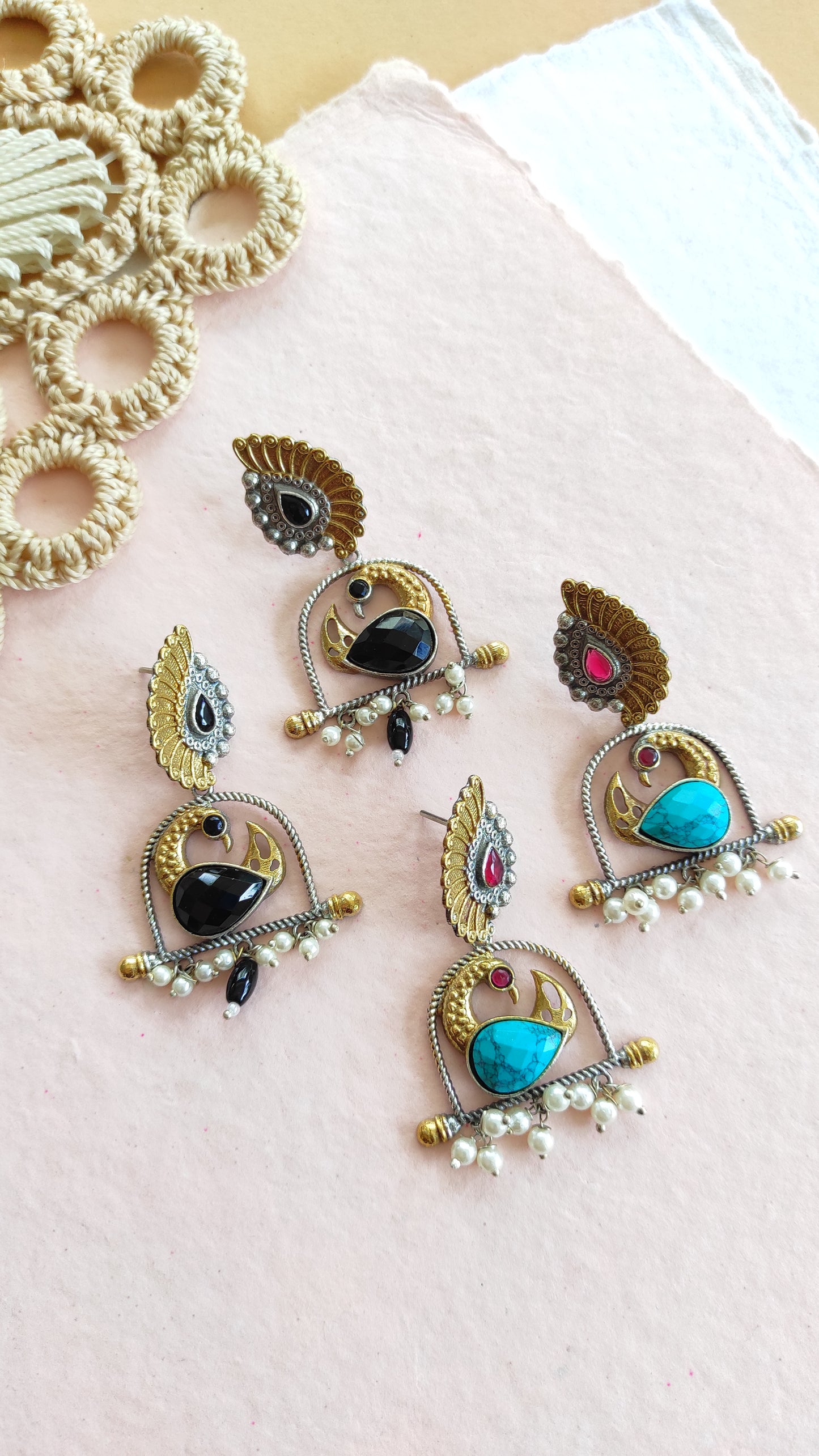 Peacock dual tone dangling earrings