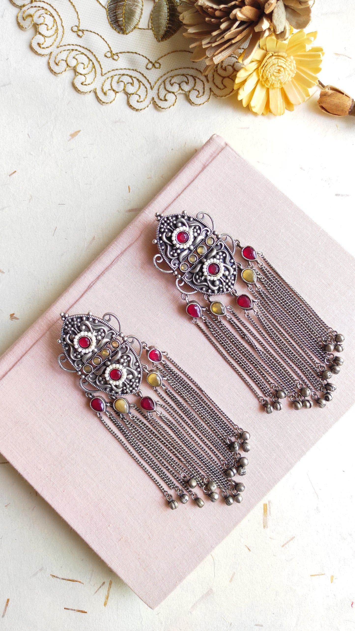 Sharvi silver lookalike earrings