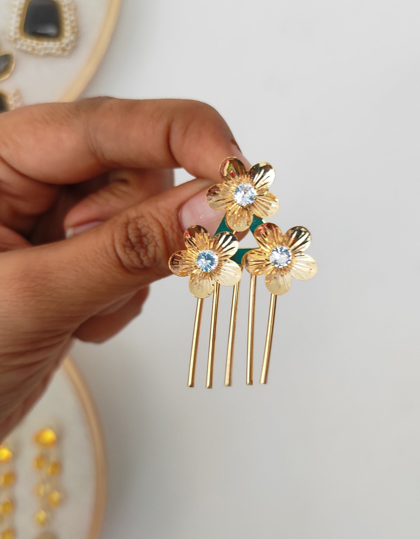 Triple flower golden earrings