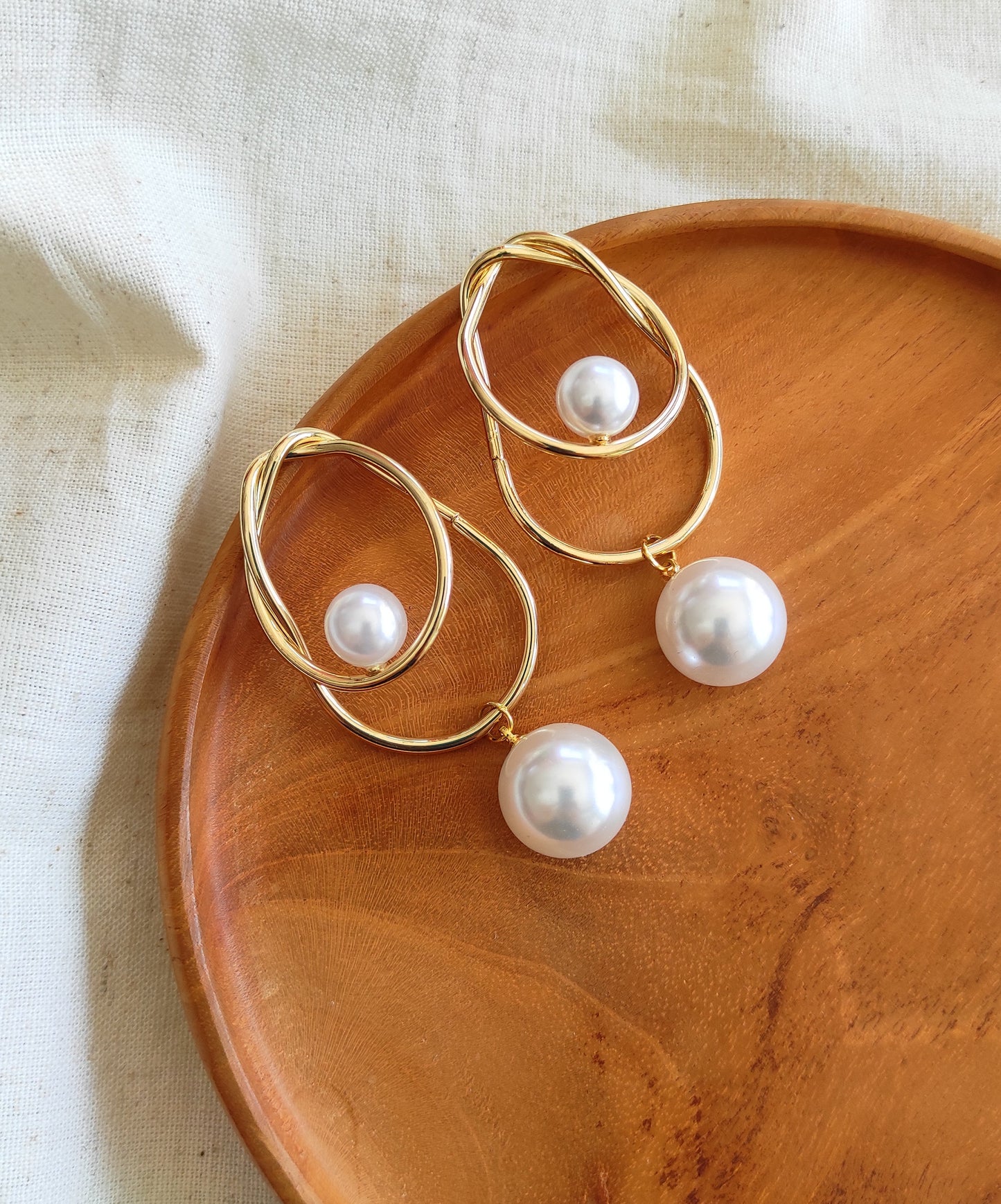 Zeal golden pearl earrings