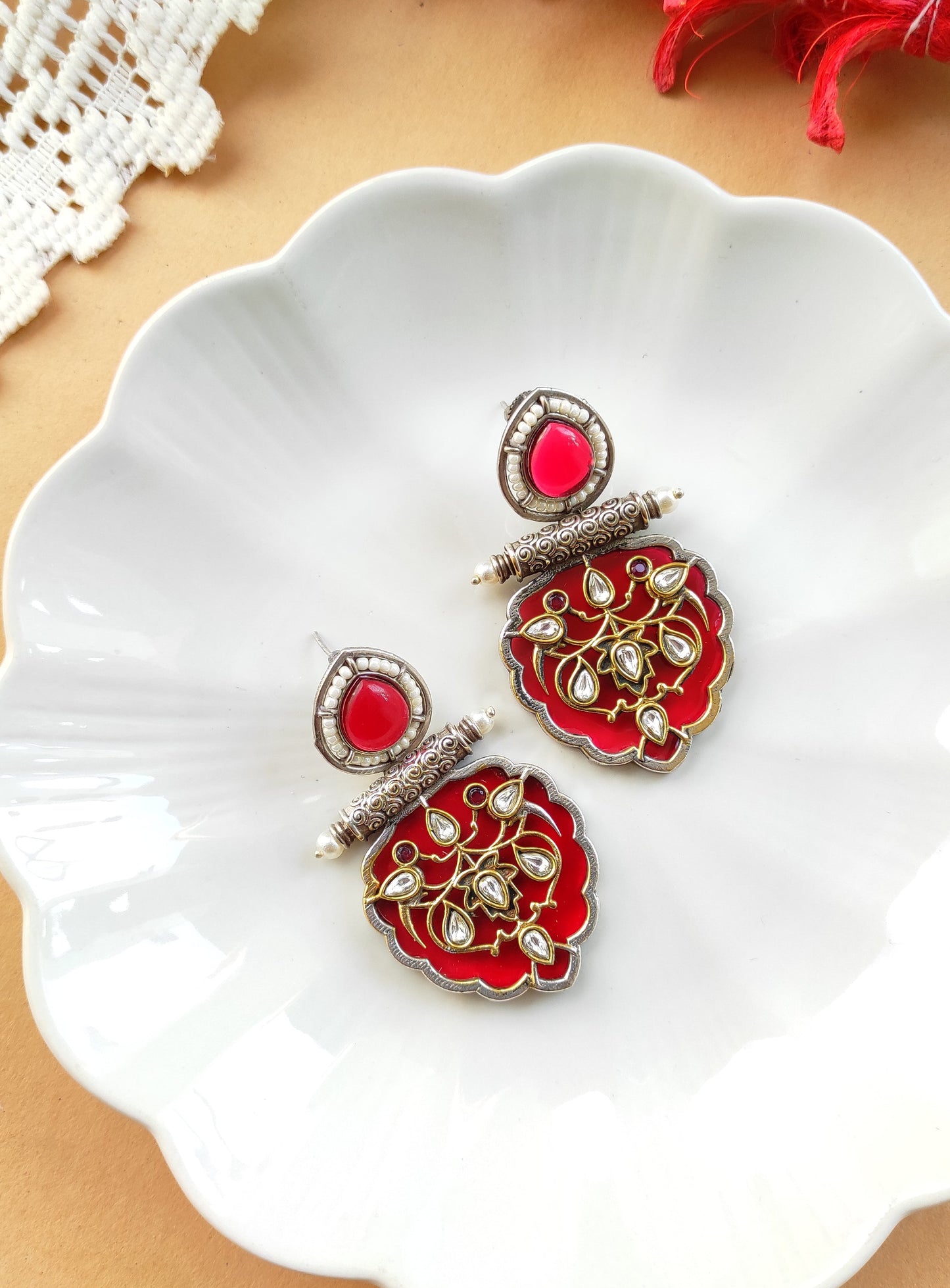 Jhilmil dual tone earrings with intricate carving and kundan