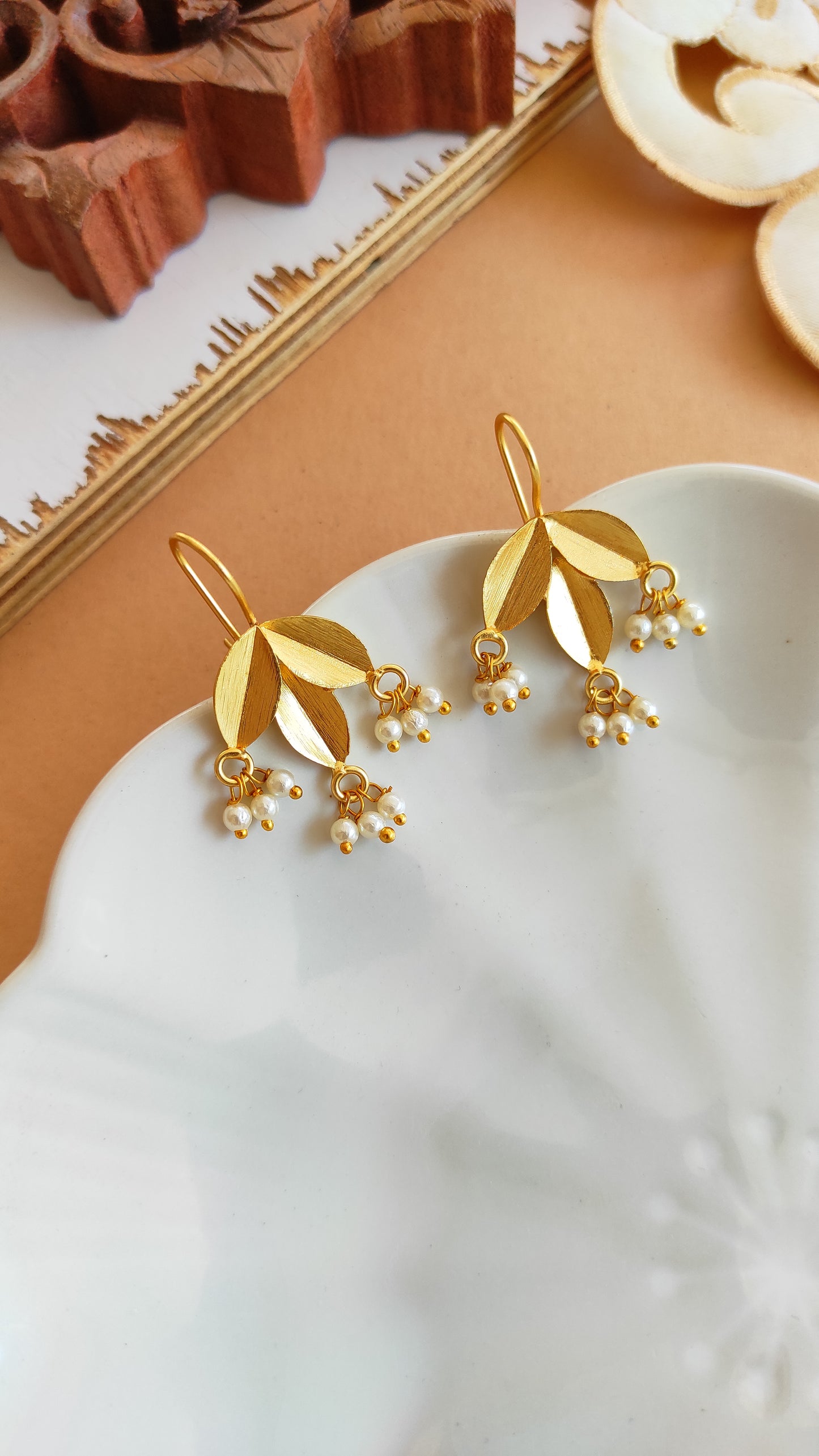 Leafy golden hook earrings