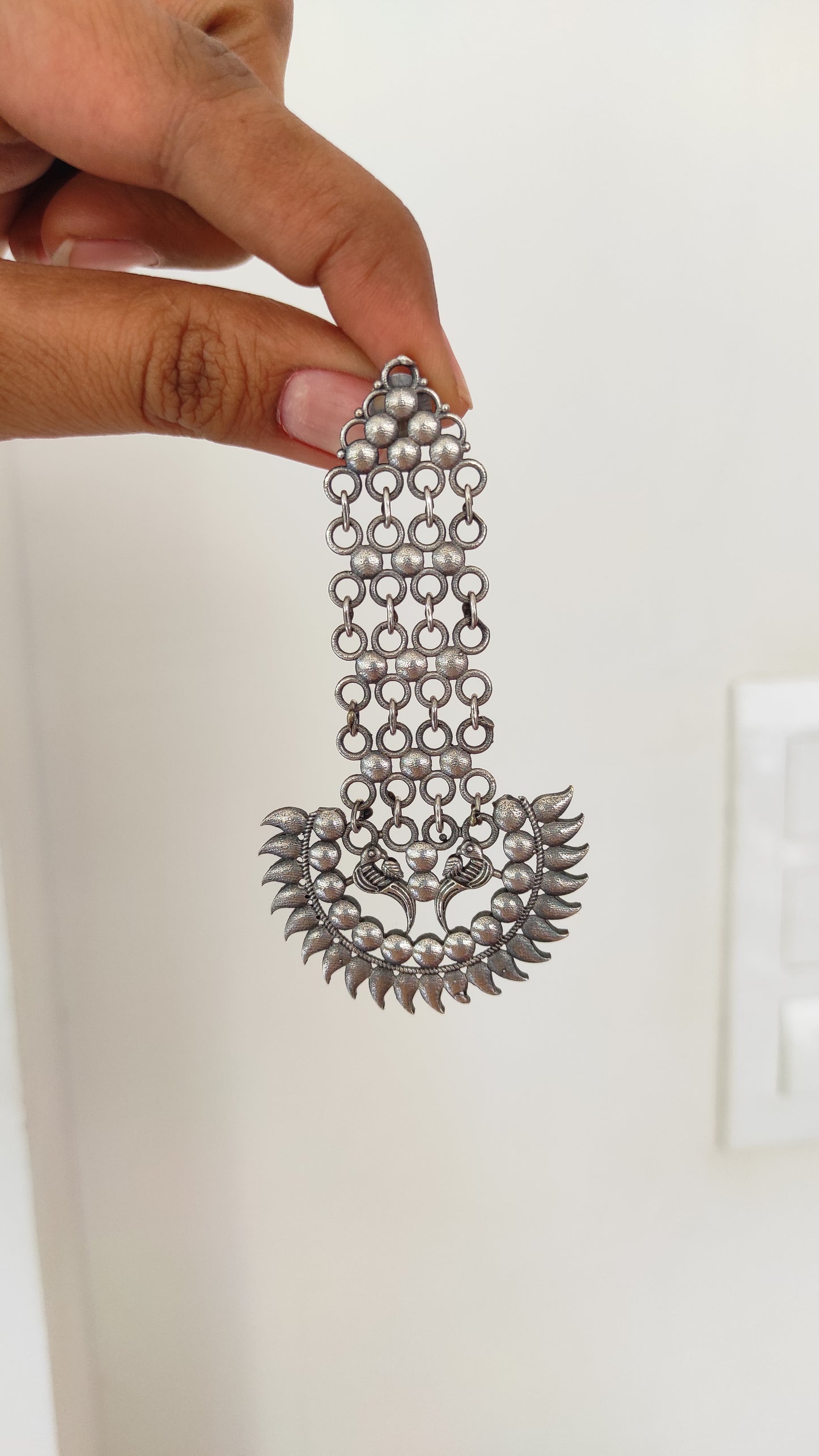 Naveena silver look alike danglers