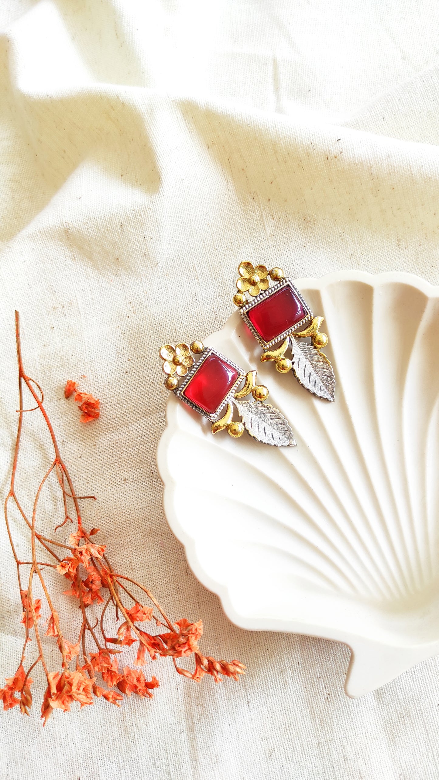 Jiya dual tone studs earrings