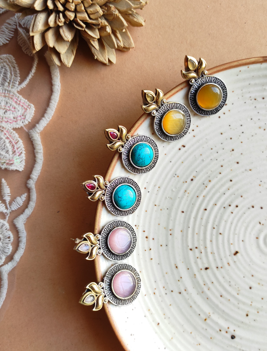 Mayuni dual tone studs earrings