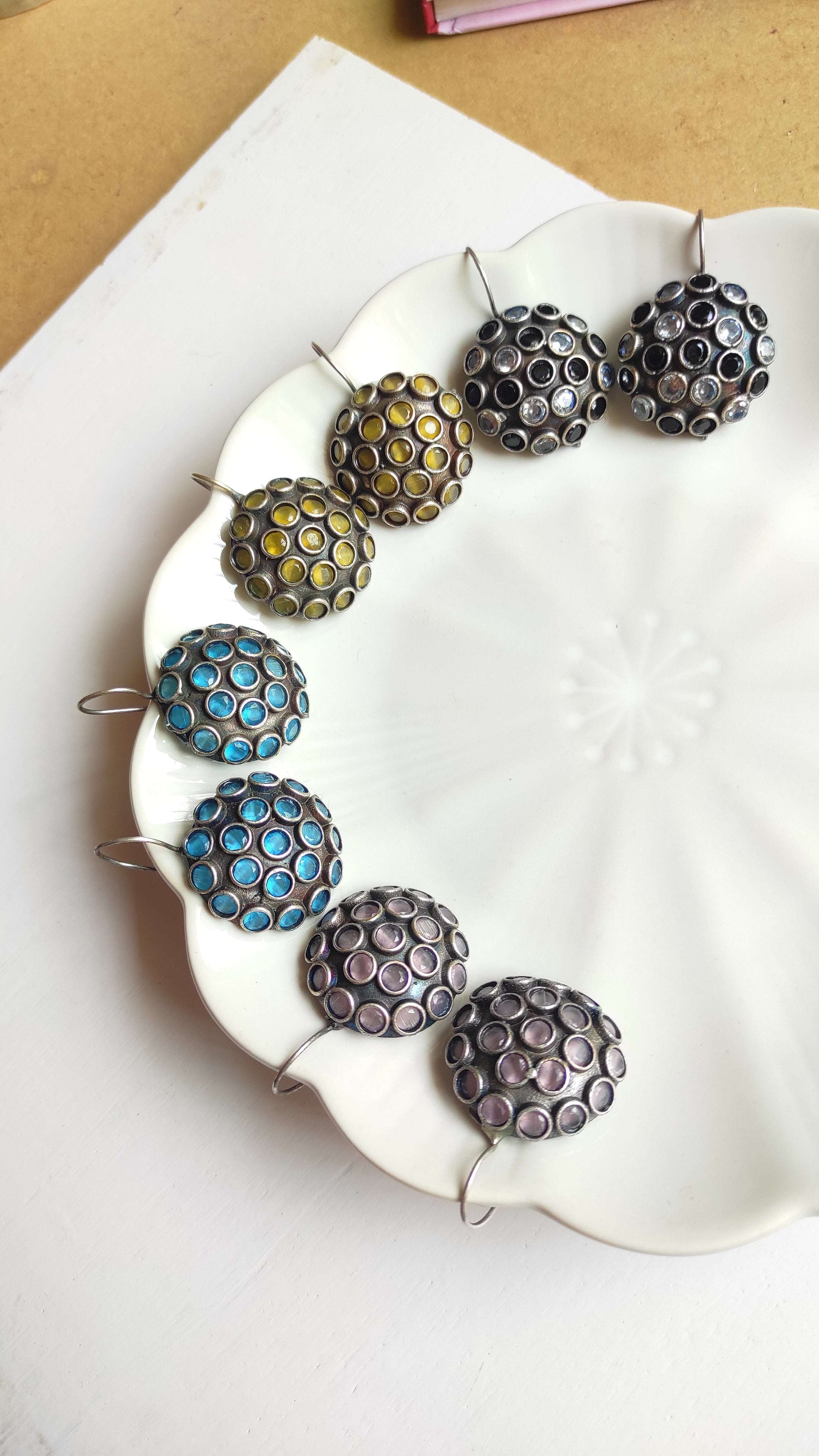 Stone studded silver lookalike hook earrings
