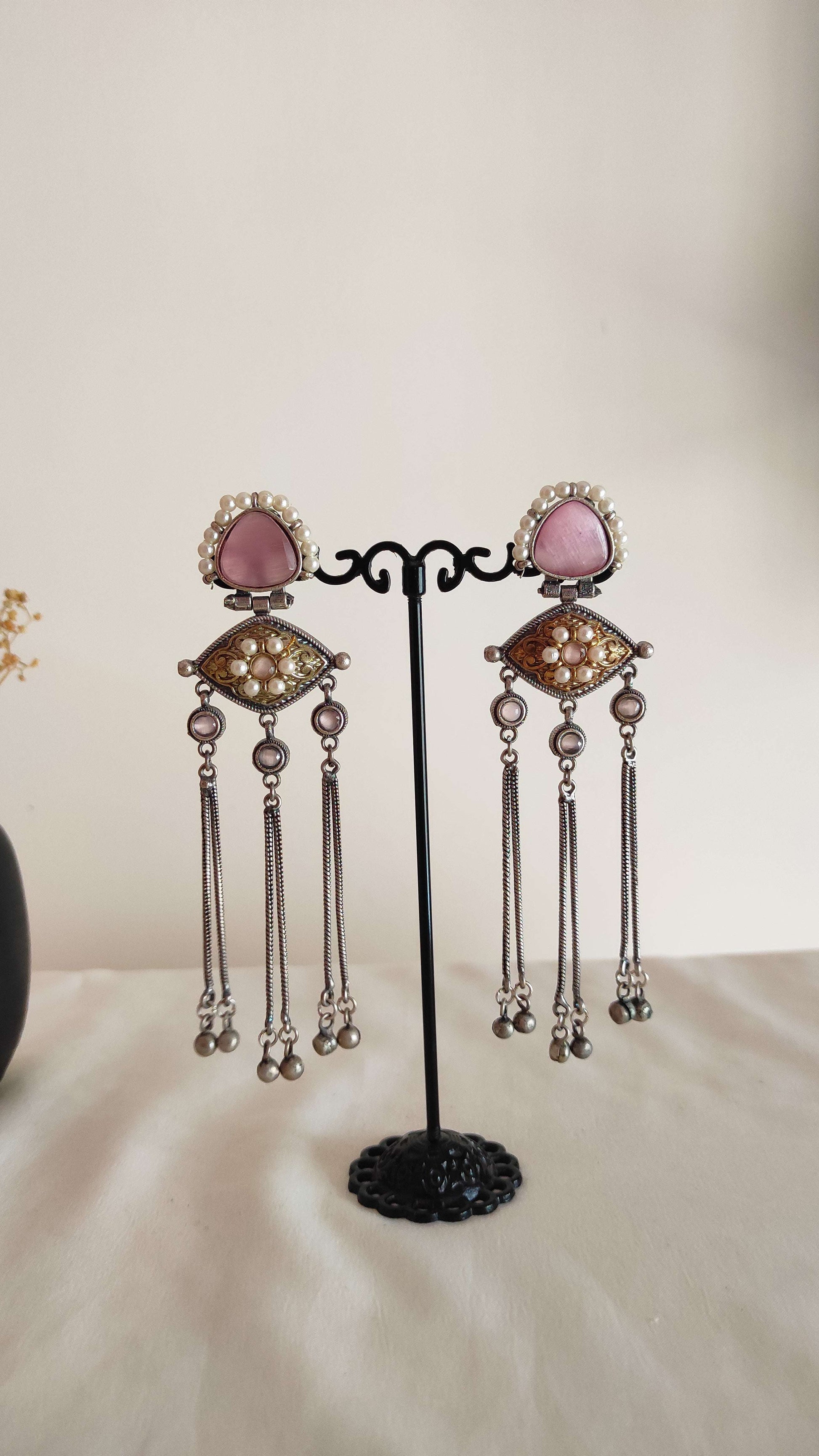 Prema silver lookalike long earrings