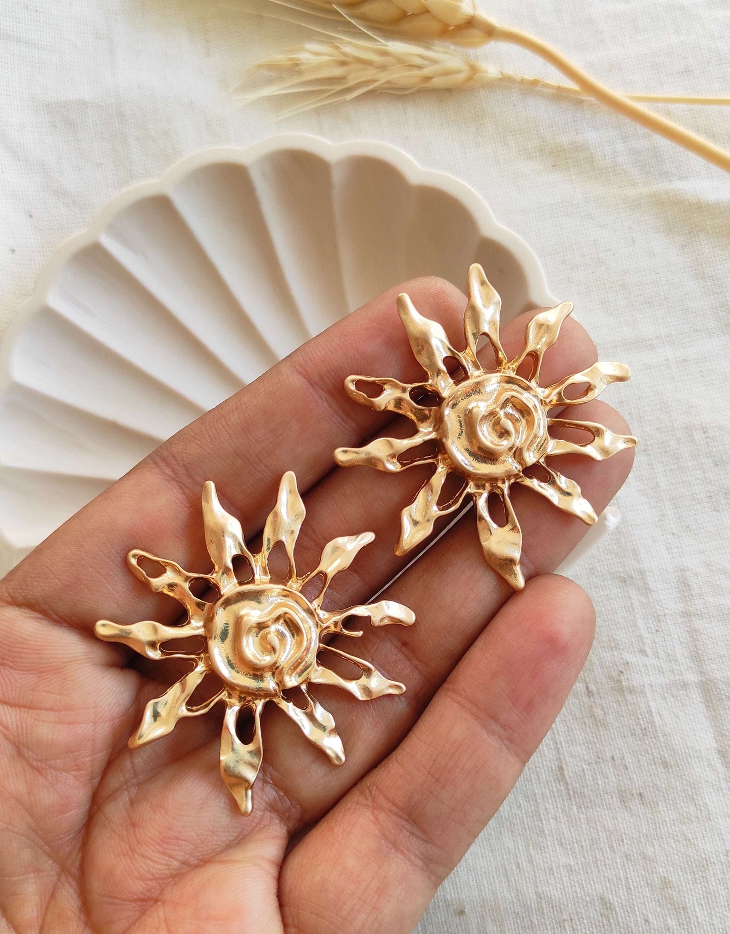 Sun golden earrings