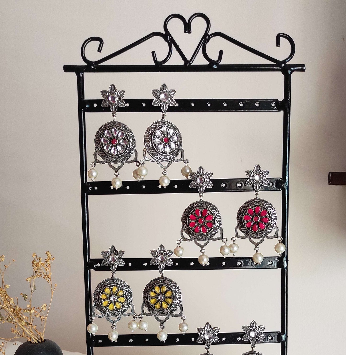 Netra silver lookalike earrings