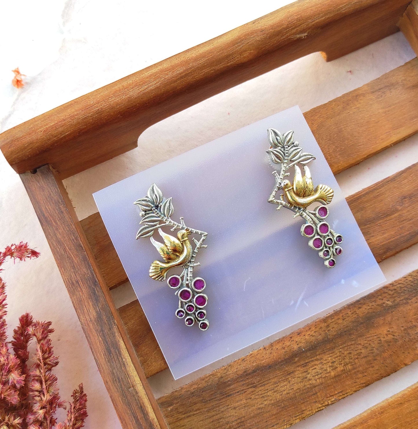 Parinda dualtone studs earrings