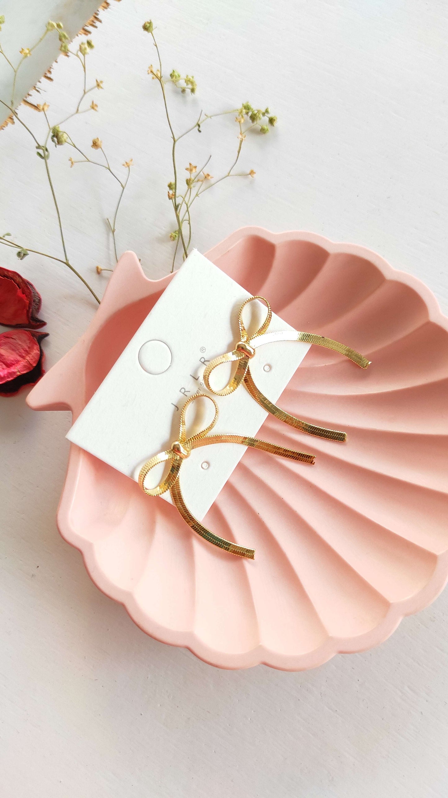 Golden bow earrings