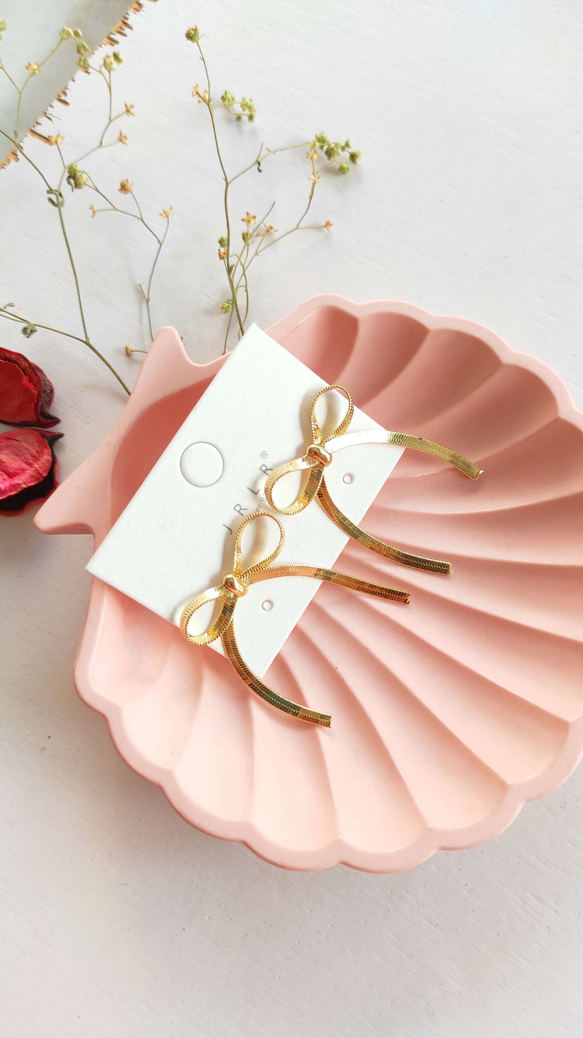 Golden bow earrings