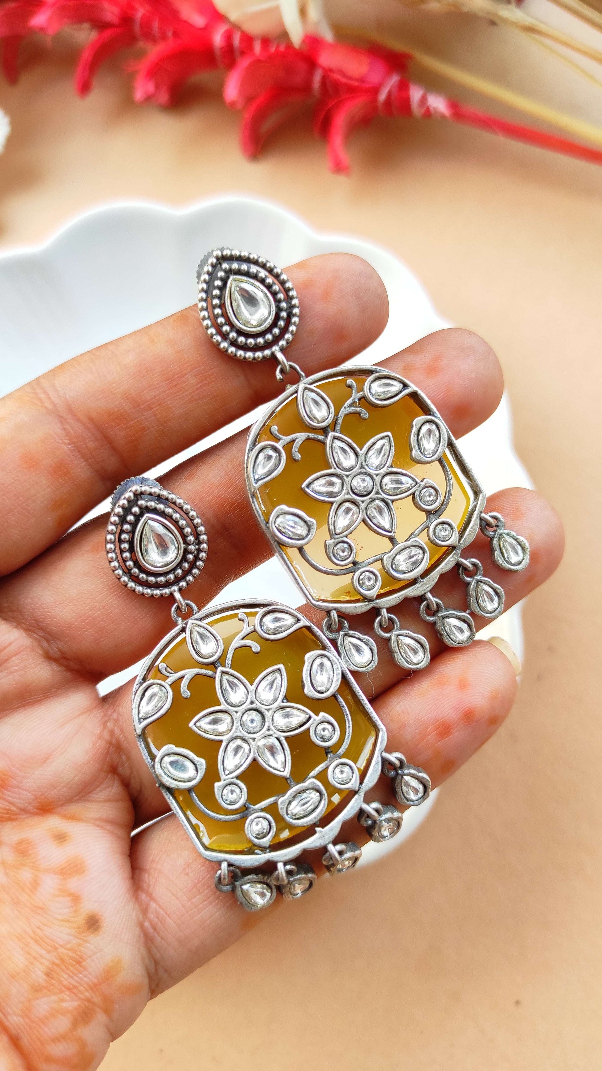 Ananya silver lookalike dangling earrings