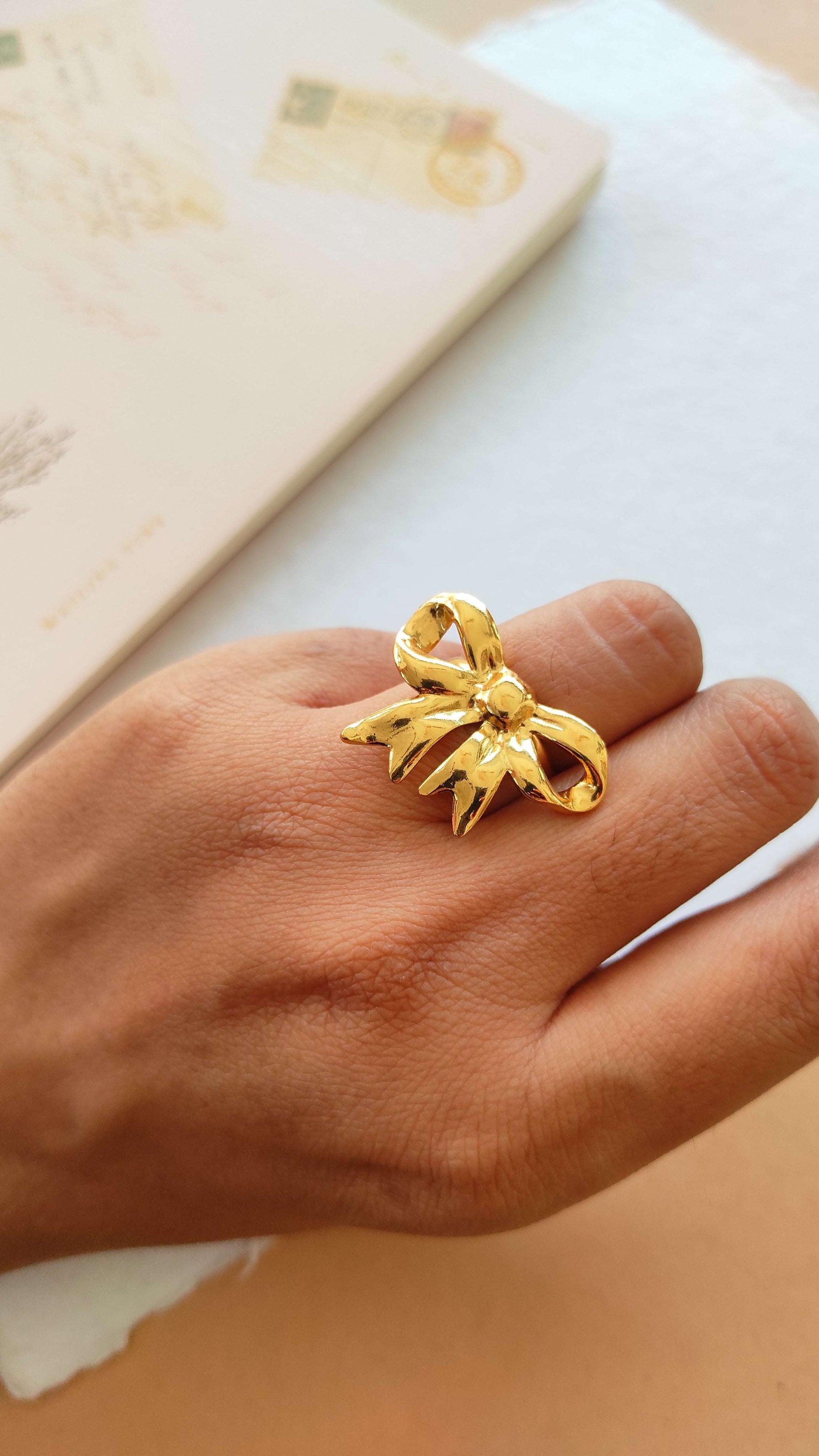 Golden bow ring
