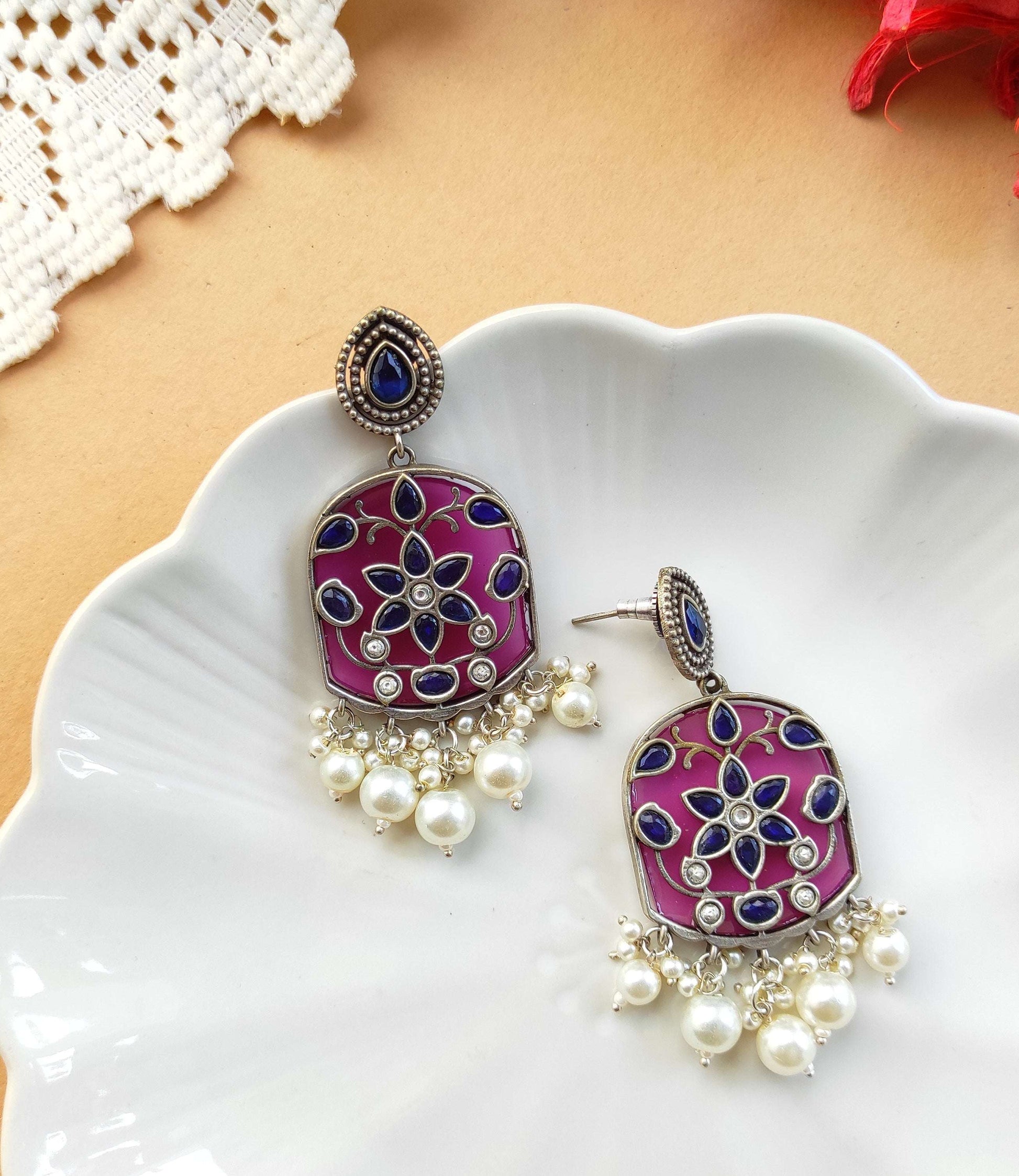 Ananya silver lookalike dangling earrings