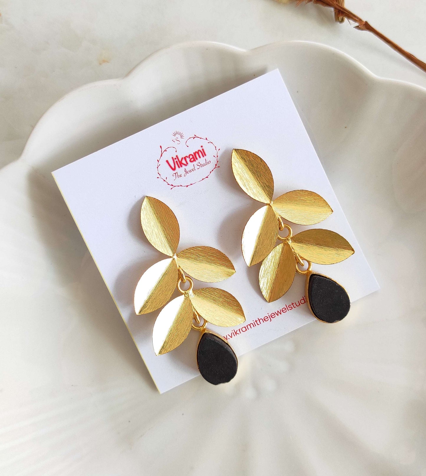 Black golden leaf earrings