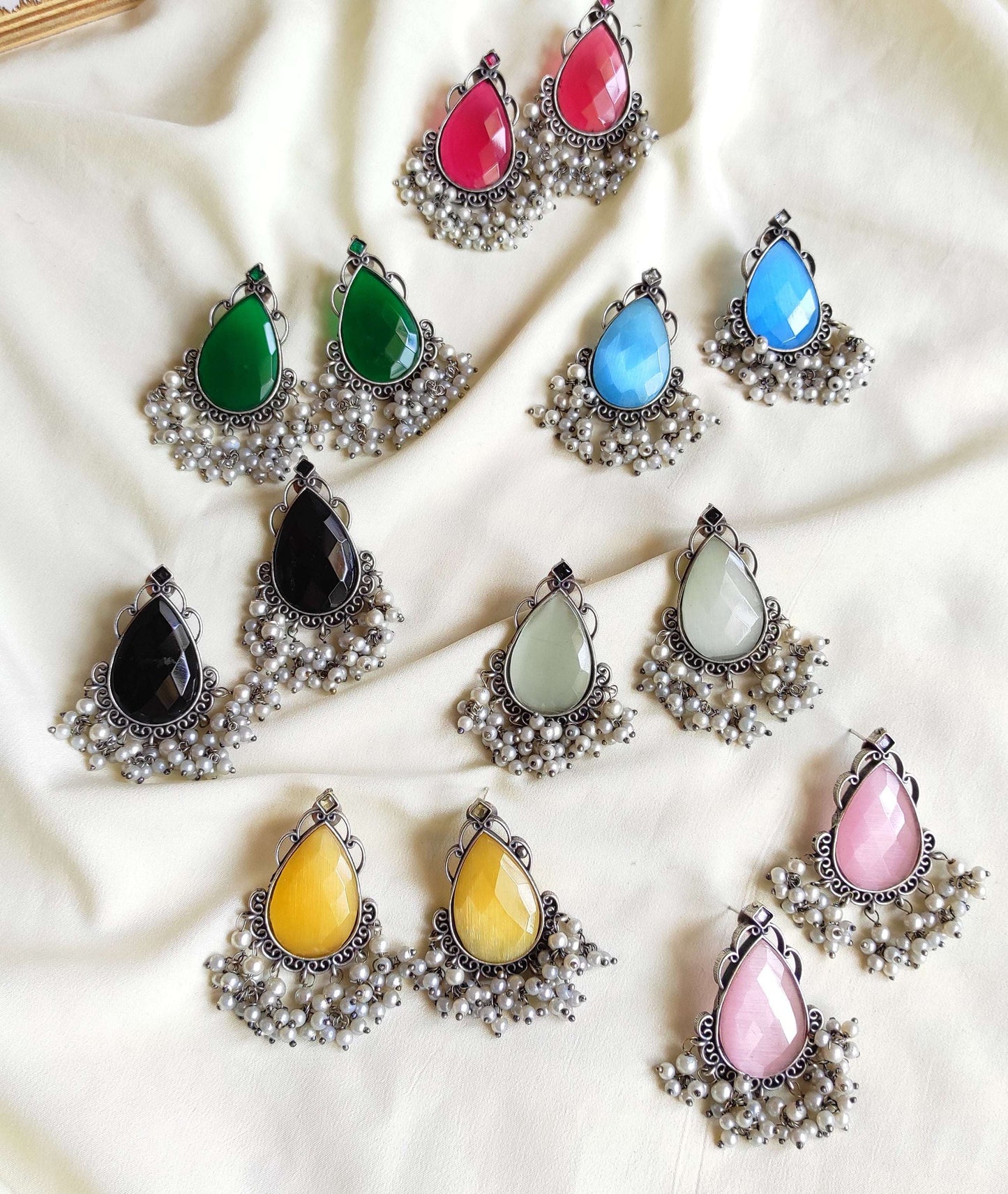 Tear drop studs with color stones and pearl hangings