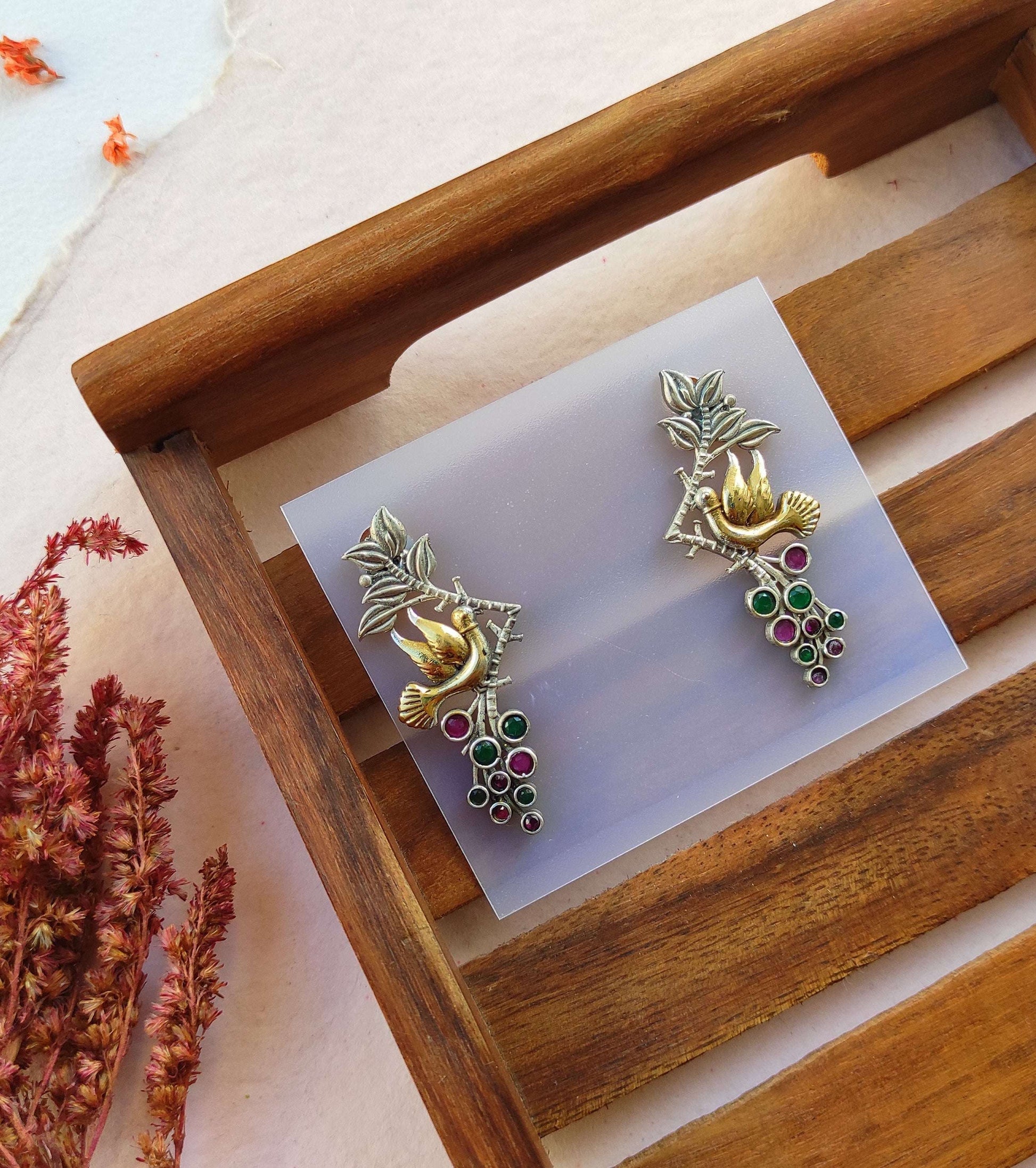 Parinda dualtone studs earrings