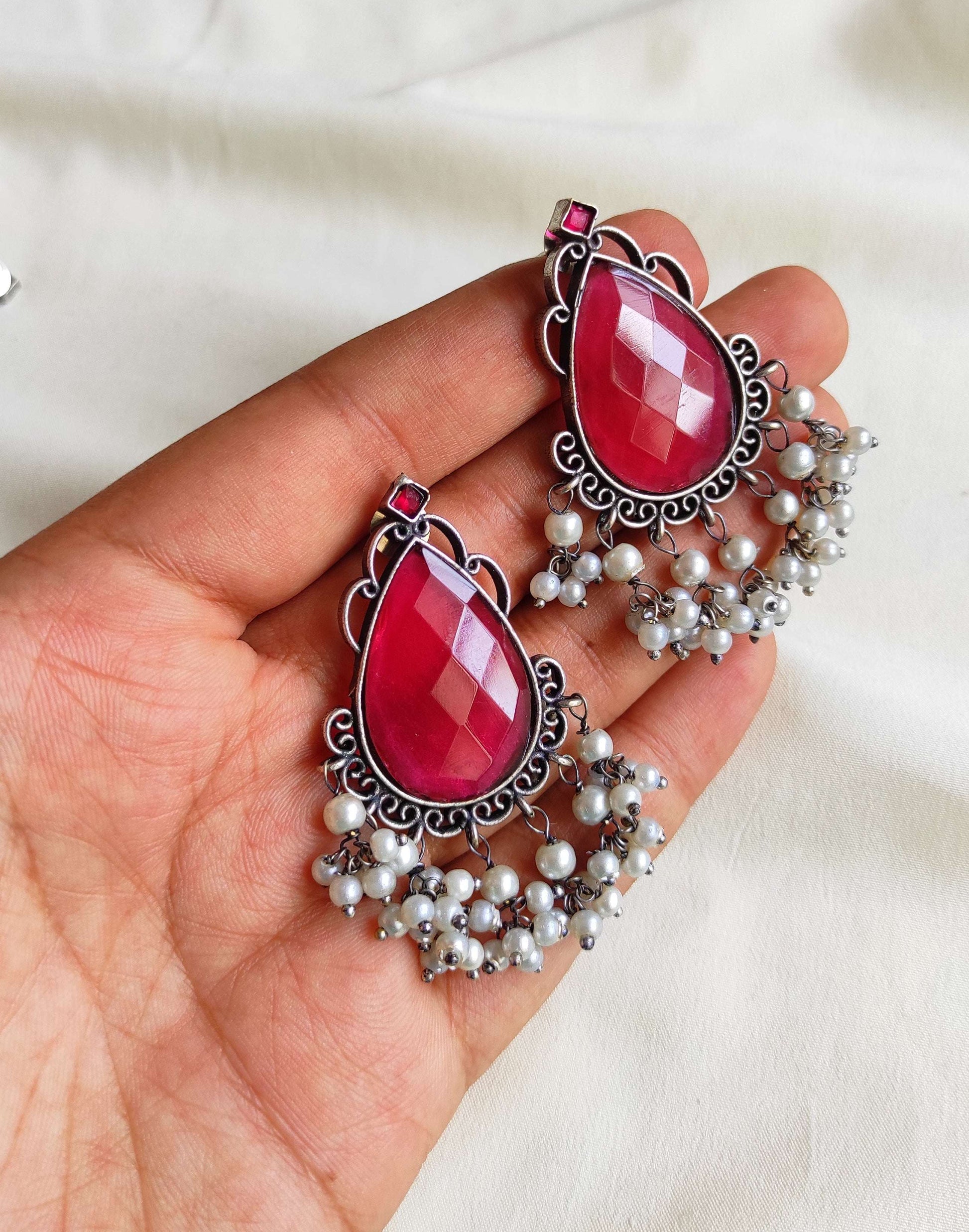 Tear drop studs with color stones and pearl hangings