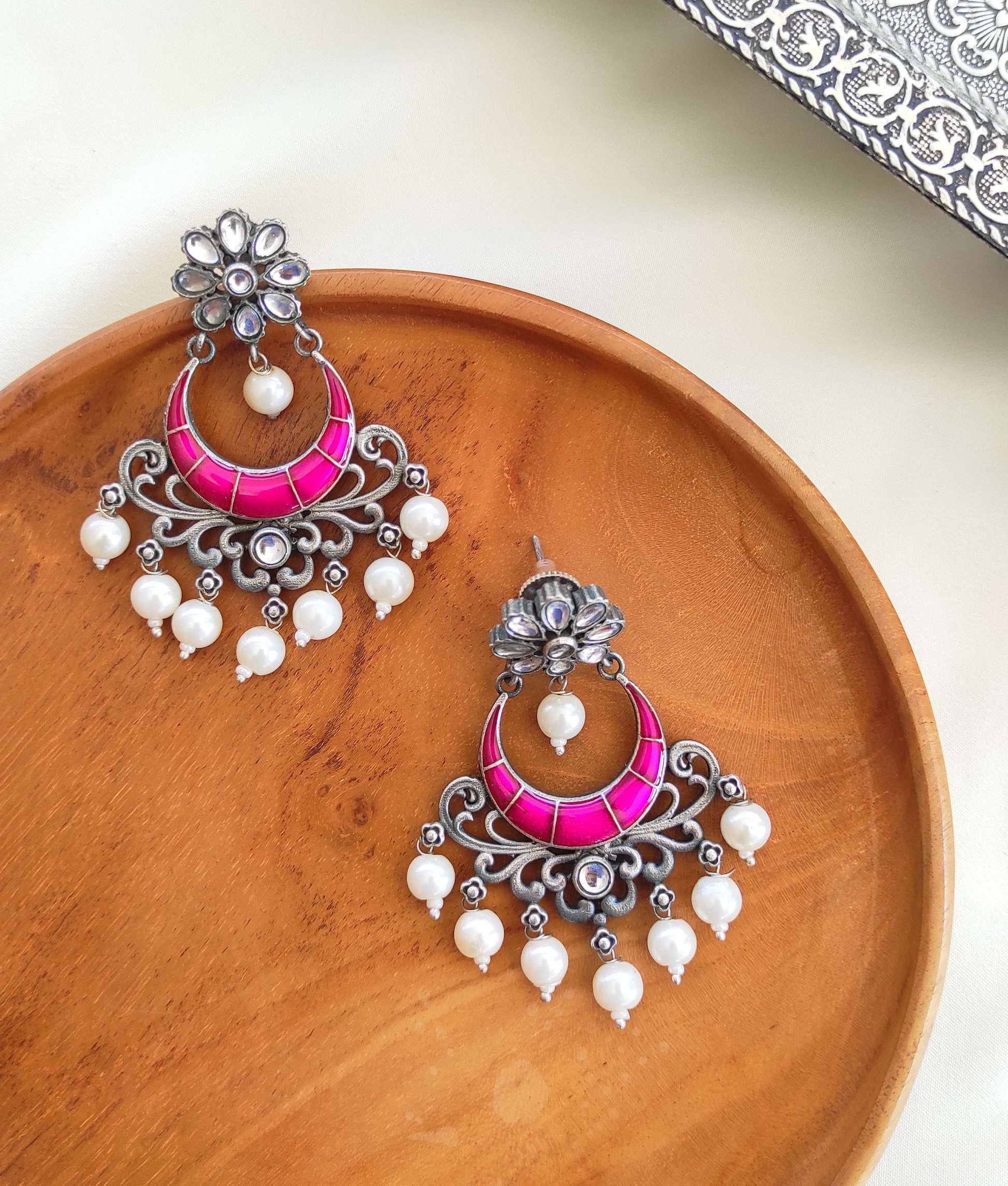 Sajani enameled chandbali earrings