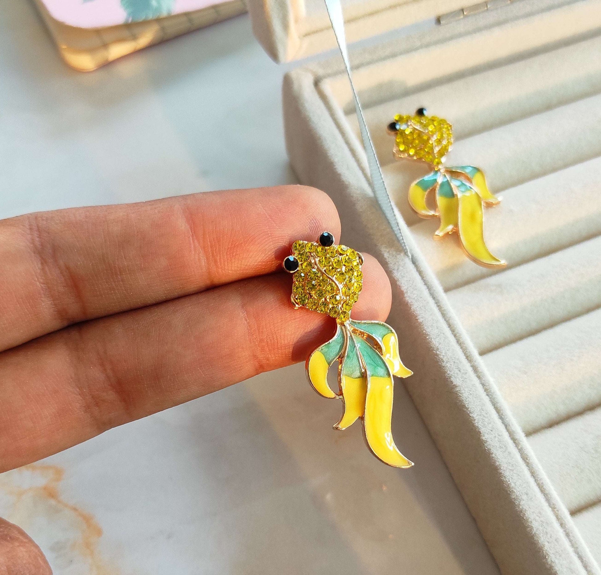 Enameled quirky fish earrings