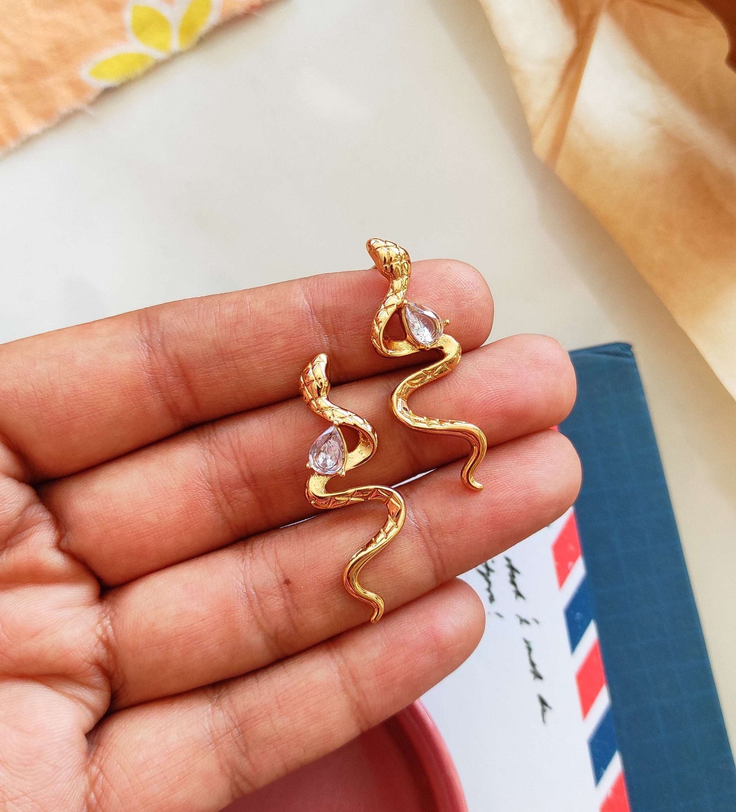 Golden serpentearrings