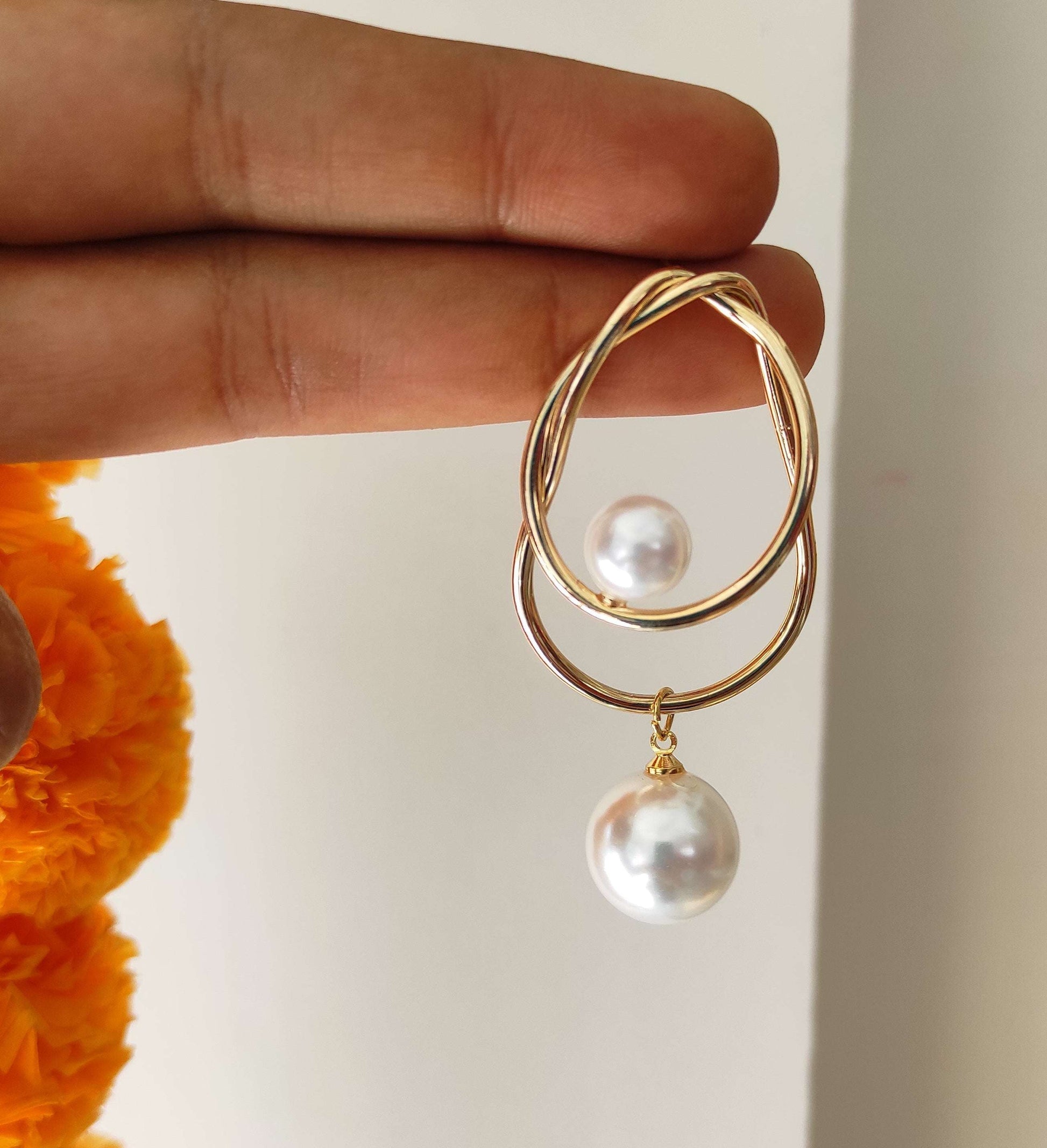 Zeal golden pearl earrings