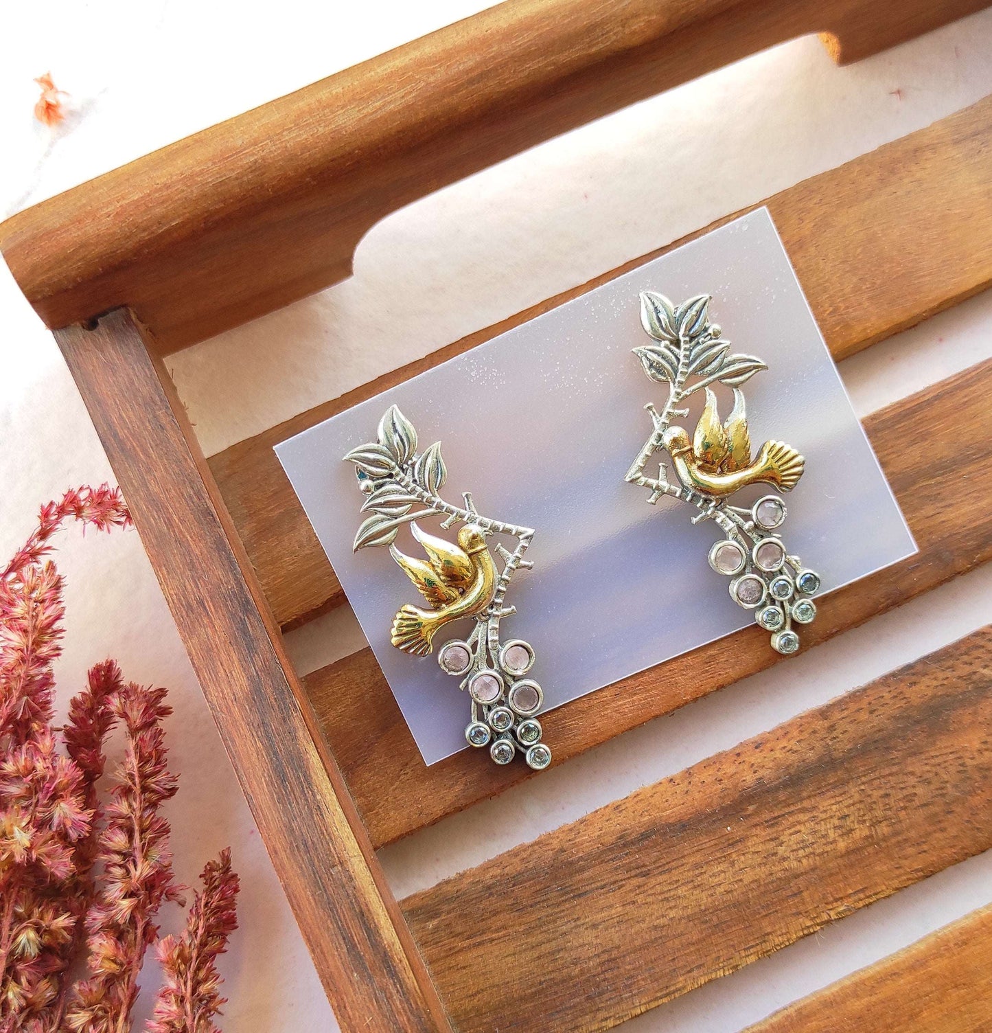 Parinda dualtone studs earrings