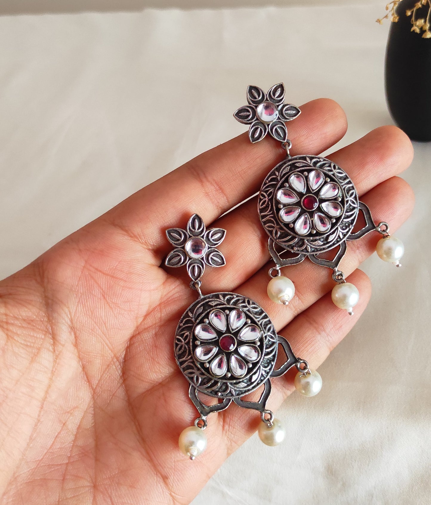 Netra silver lookalike earrings