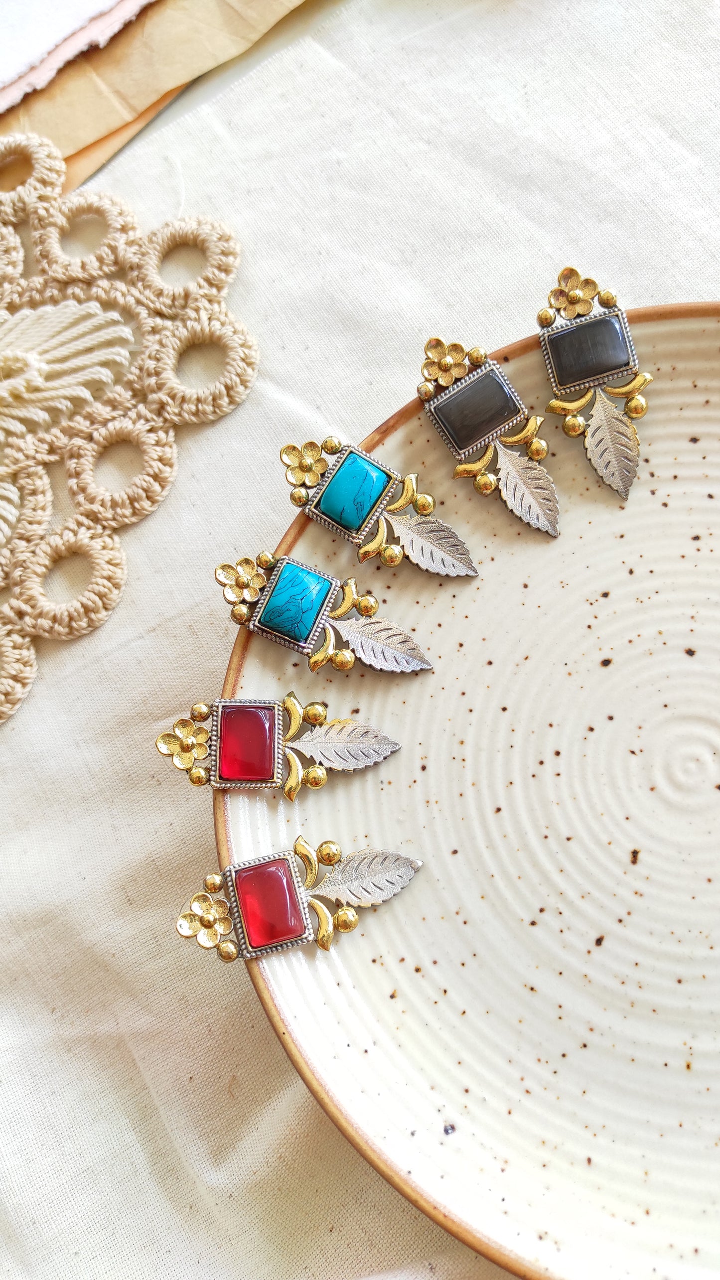 Jiya dual tone studs earrings