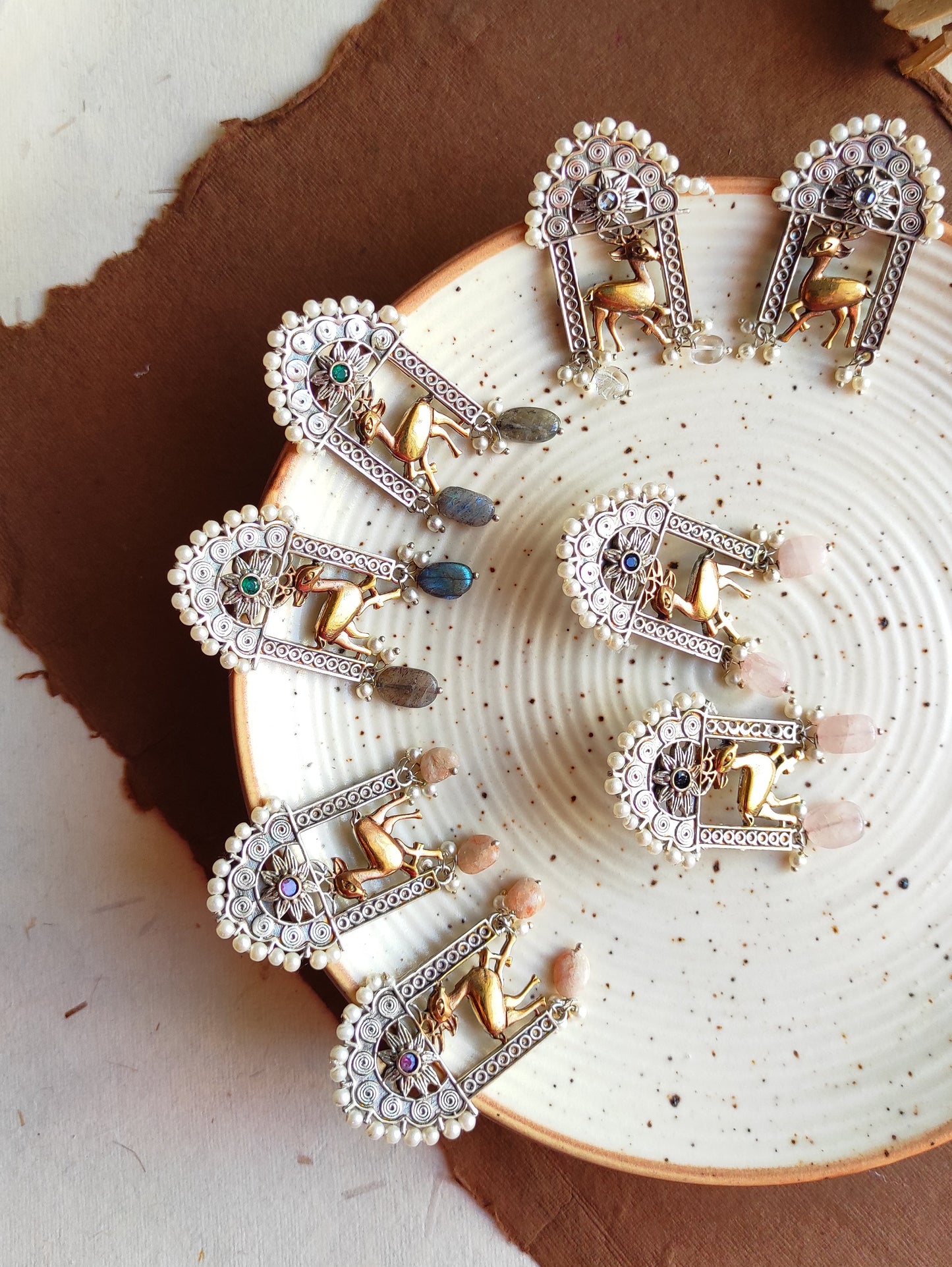 Hirni dualtone studs earrings