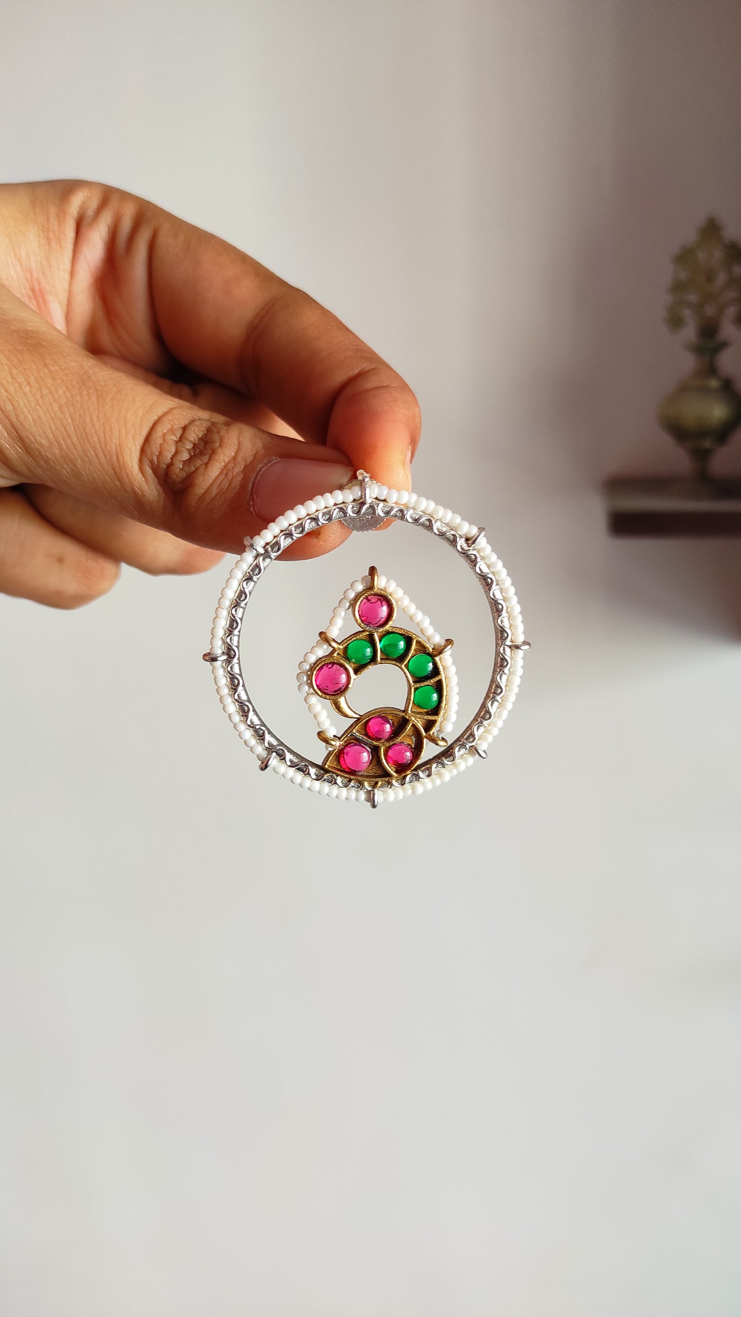 Beaded peacock studs