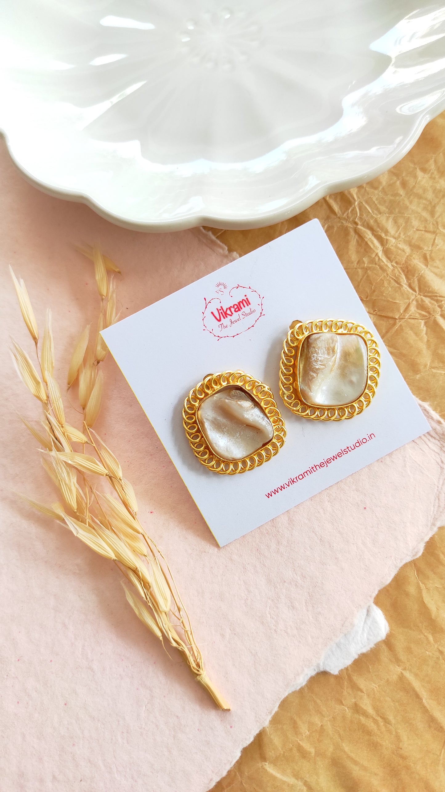Golden contemporary studs earrings