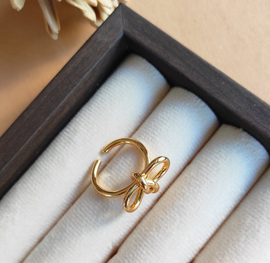 Knotted bow gold plated adjustable finger ring