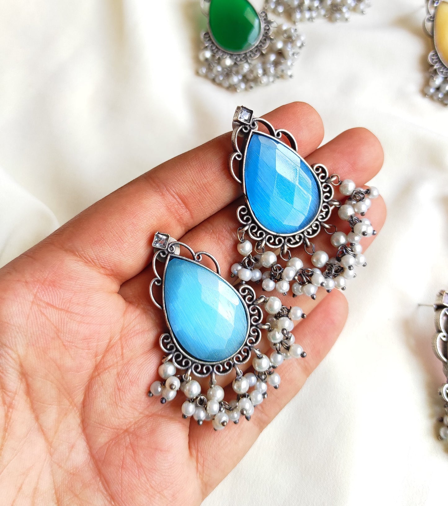Tear drop studs with color stones and pearl hangings