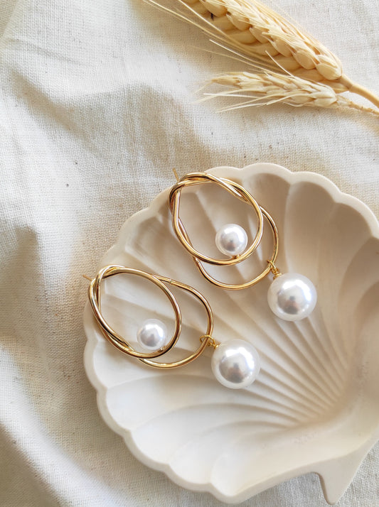 Zeal golden pearl earrings