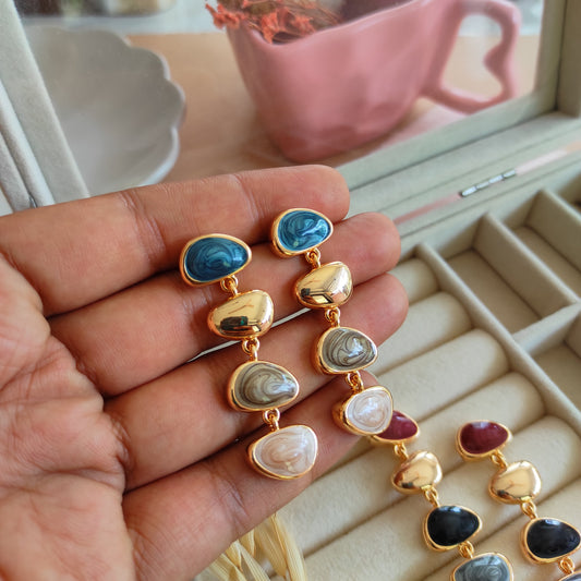 Golden enameled bubble dangling earrings