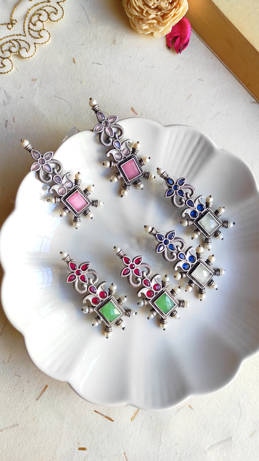 Sapna silver lookalike studs earrings