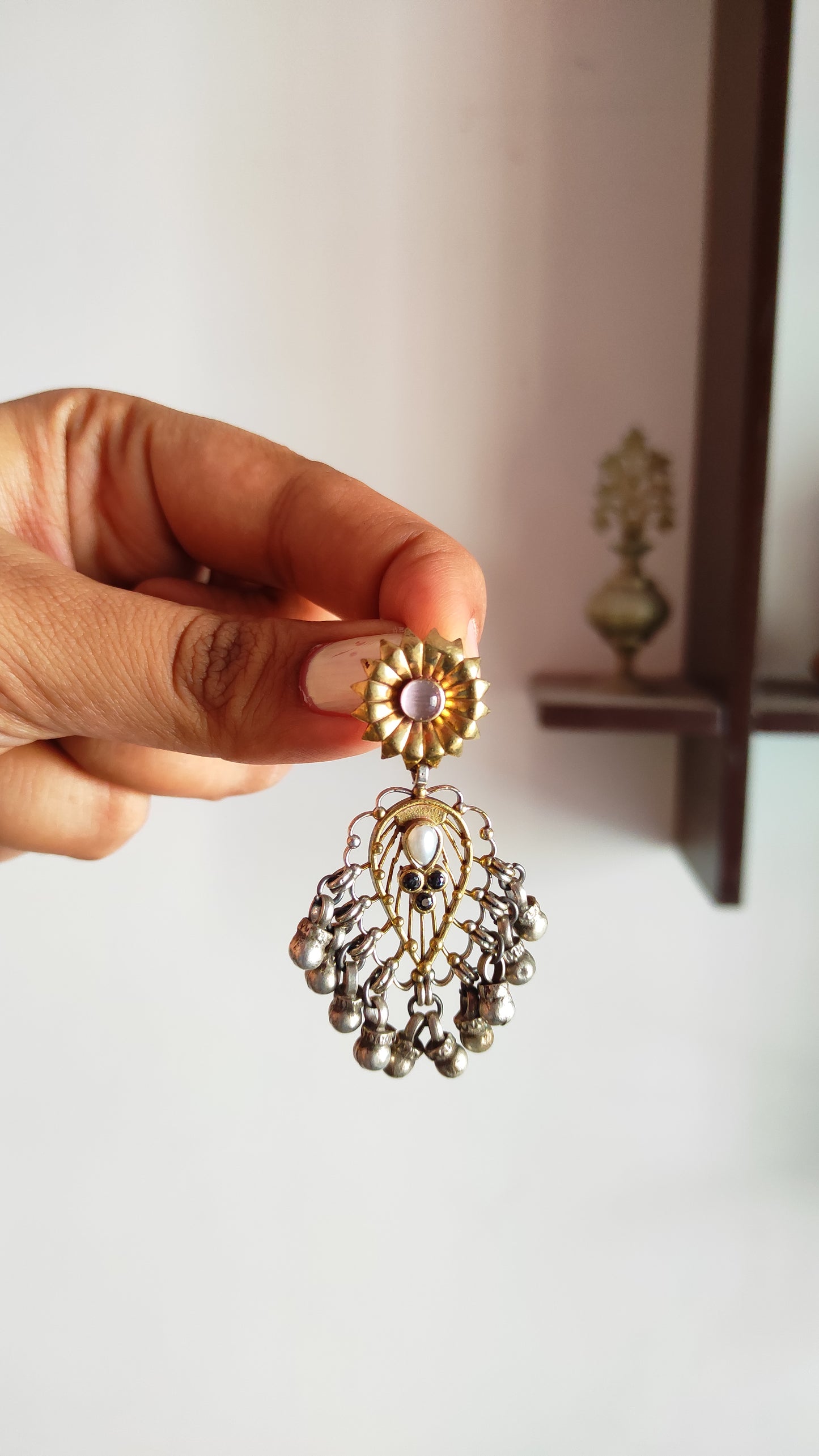 Kriti antique dual tone danglers