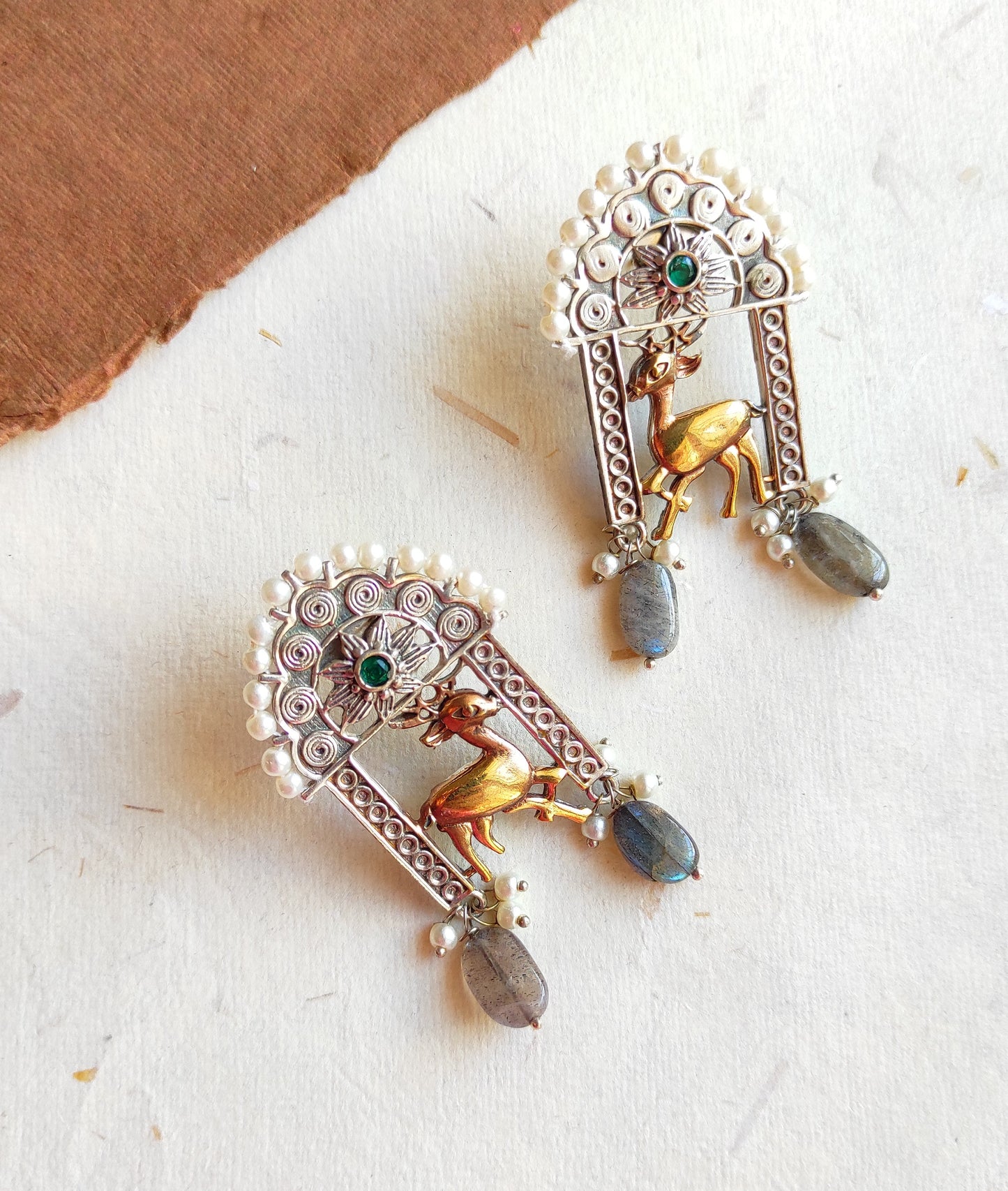 Hirni dualtone studs earrings