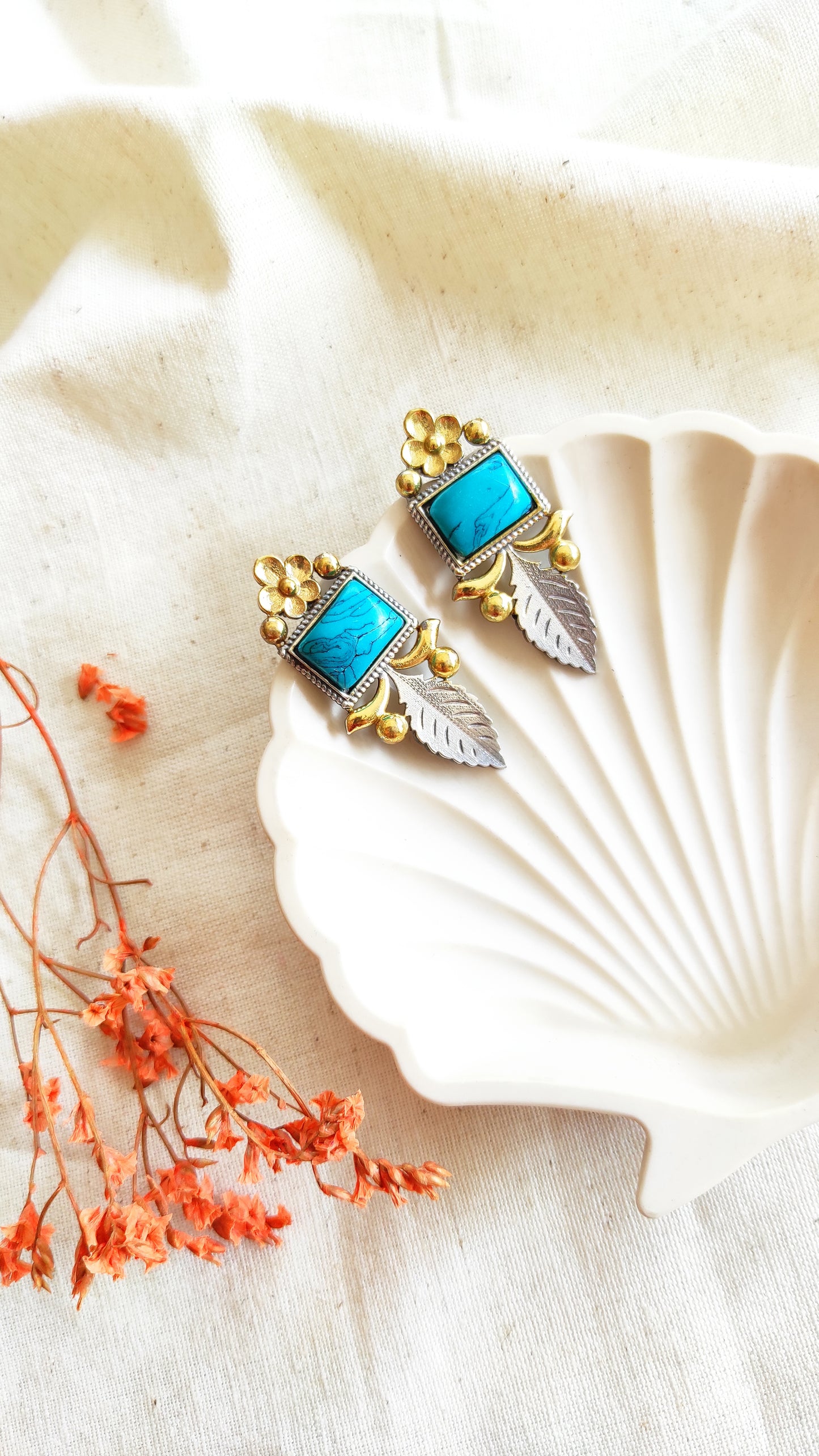 Jiya dual tone studs earrings