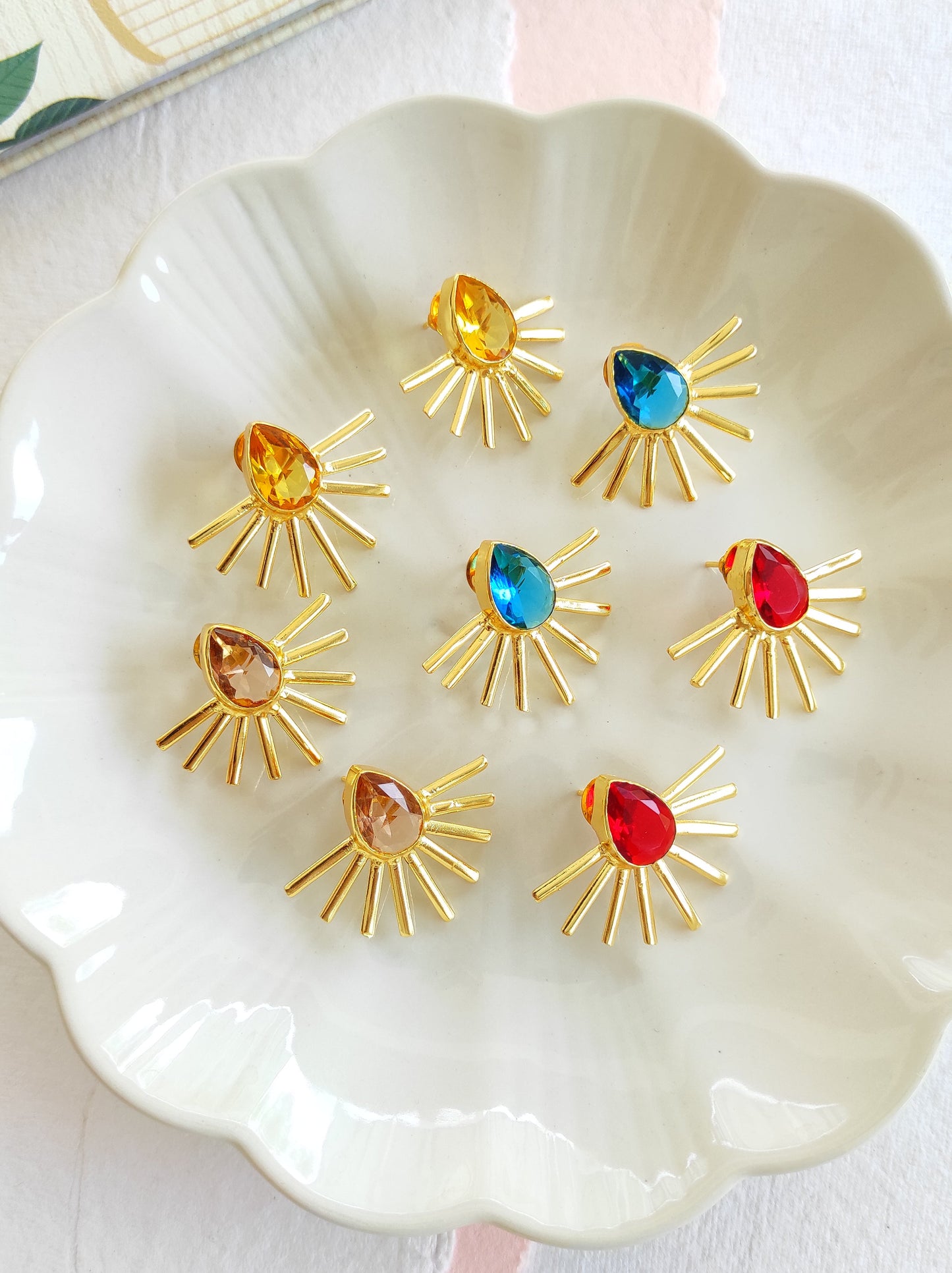 Golden spike studs earrings with premium glass stones