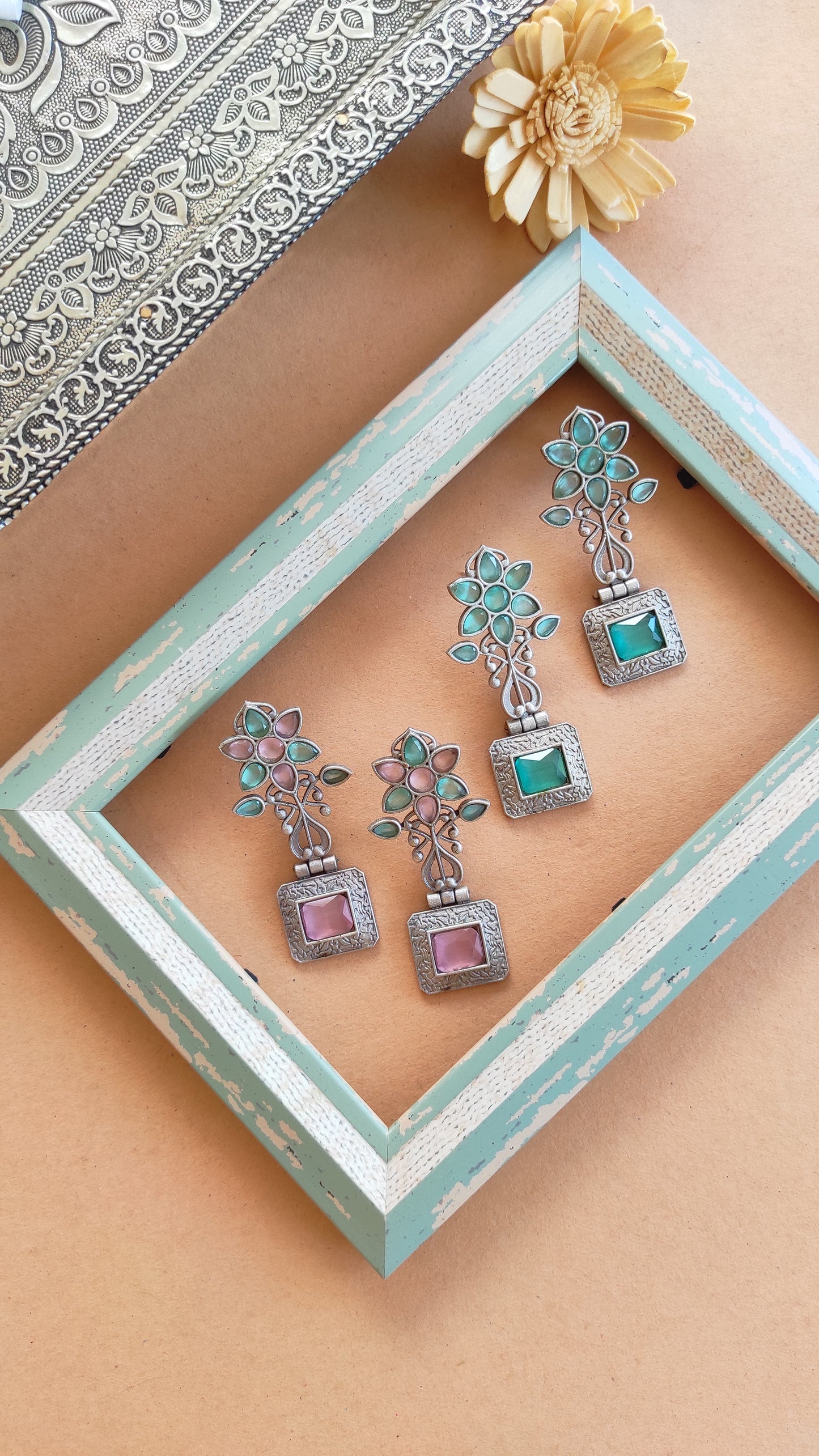 Kalpana silver look alike stud earrings SRE1