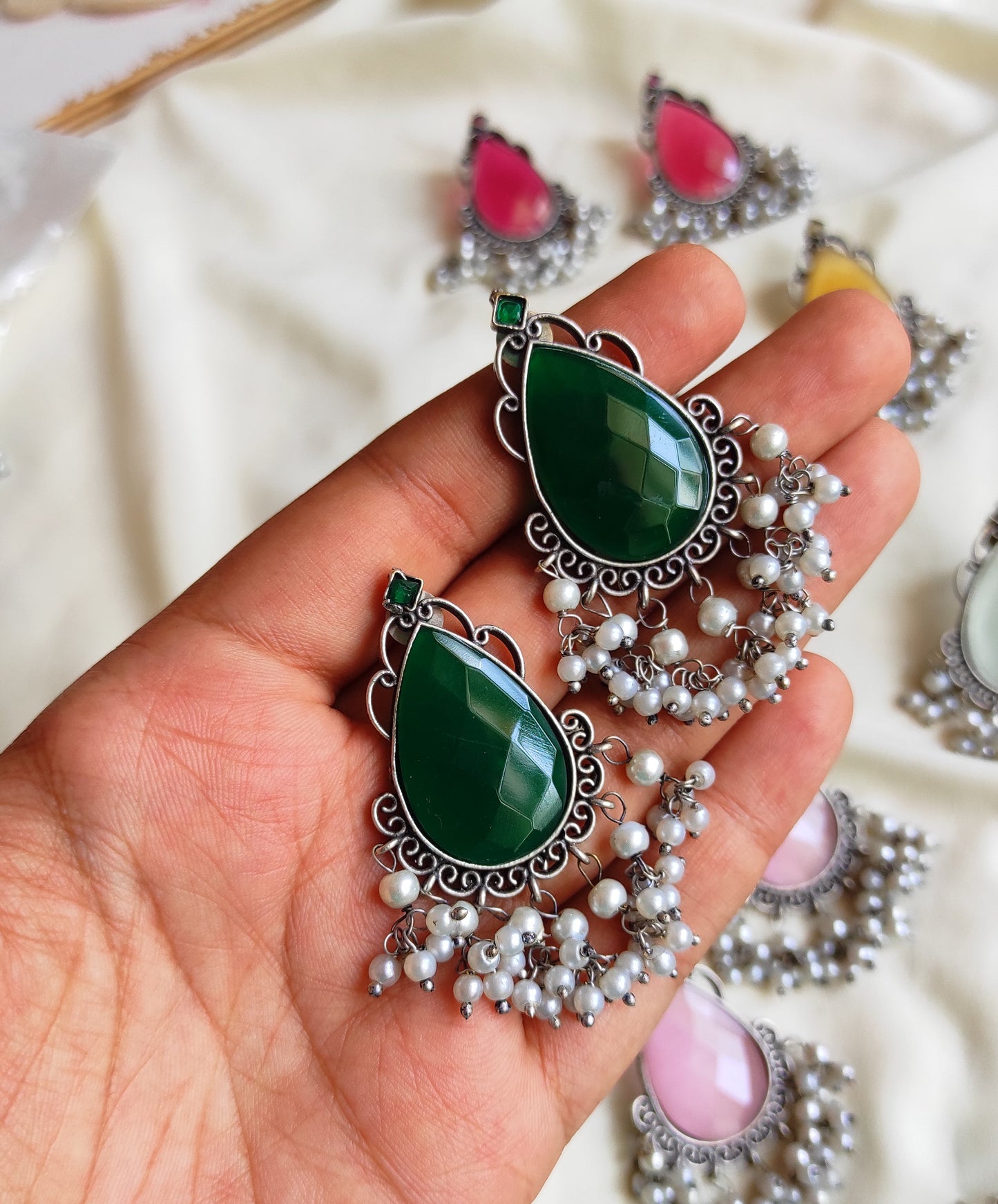 Tear drop studs with color stones and pearl hangings